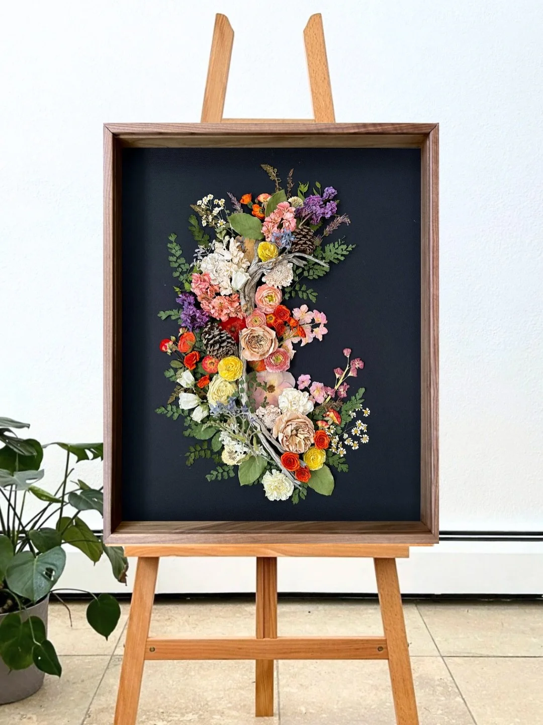 This 24x30 preferred frame with Masterpiece Acrylic brings museum-level clarity and depth, allowing every preserved petal to feel almost touchable.

Designed to make a statement while protecting your flowers for years to come 

Swipe to see all the d