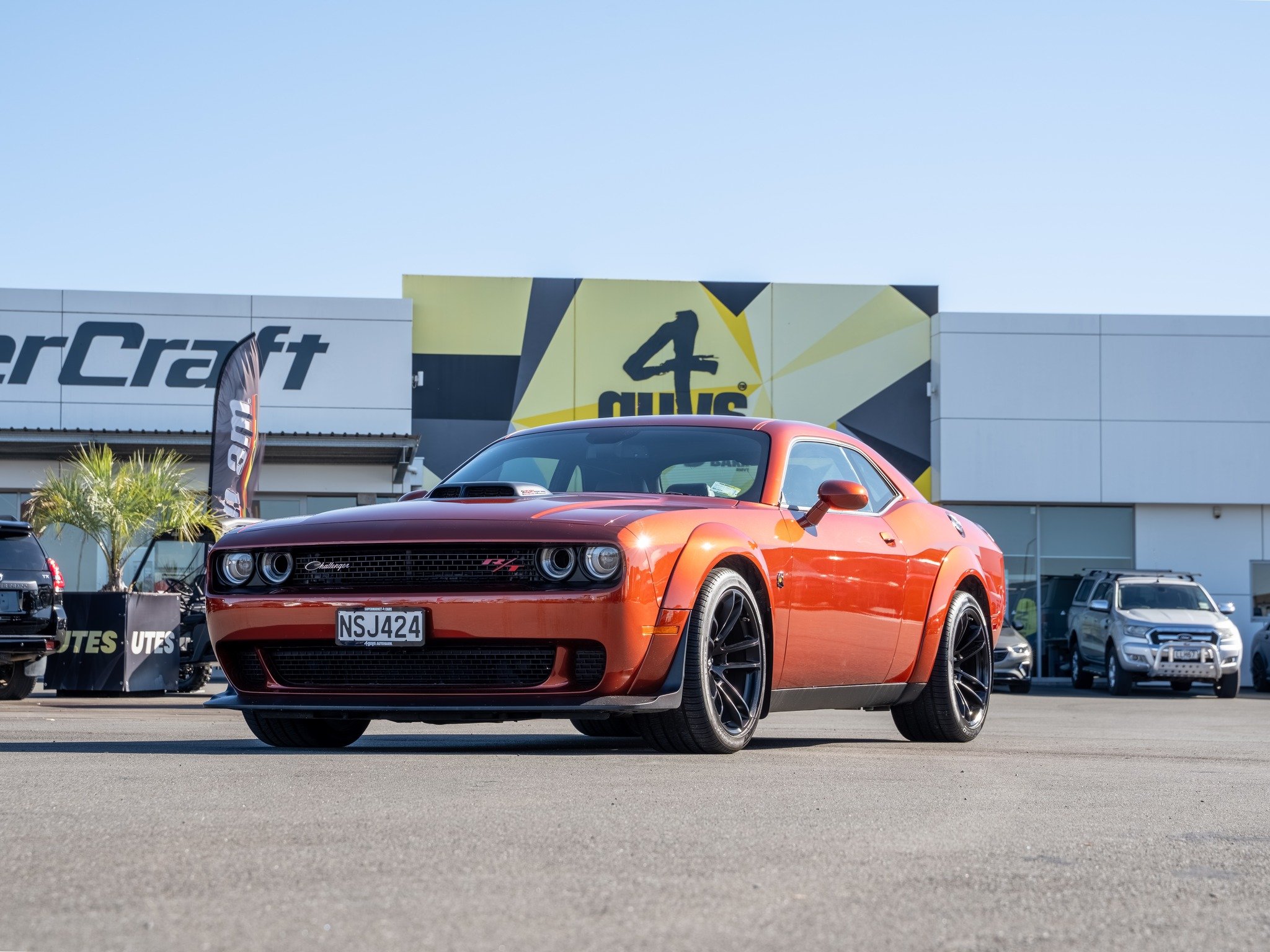 RIGHT-HAND DRIVE 2021 Dodge Challenger Scat Pack Widebody Shaker 6.4L HEMI V8 

If you're after something a bit different, this one ticks a lot of boxes. A factory Shaker, factory Widebody, exceptionally low kilometres, and most importantly, right‑ha