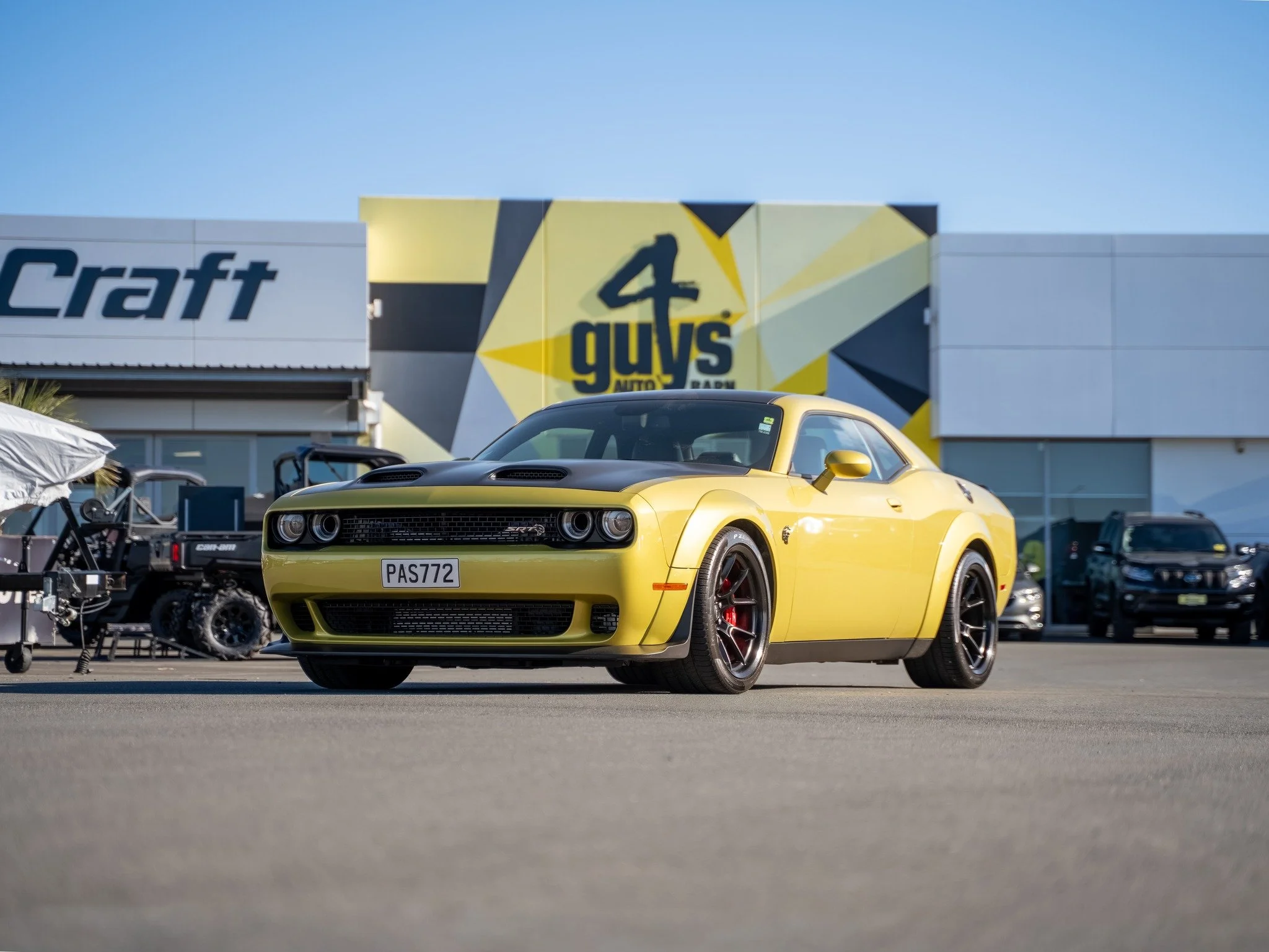 One of only 32 Gold Rush Hellcat Redeyes built in 2021 worldwide. 797 hp supercharged 6.2L HEMI V8. Mid-3 second 0-60, 10.6 second quarter-mile. Just 11,425 km.

This isn't a car that whispers. The Hellcat Redeye announces itself with a supercharged 