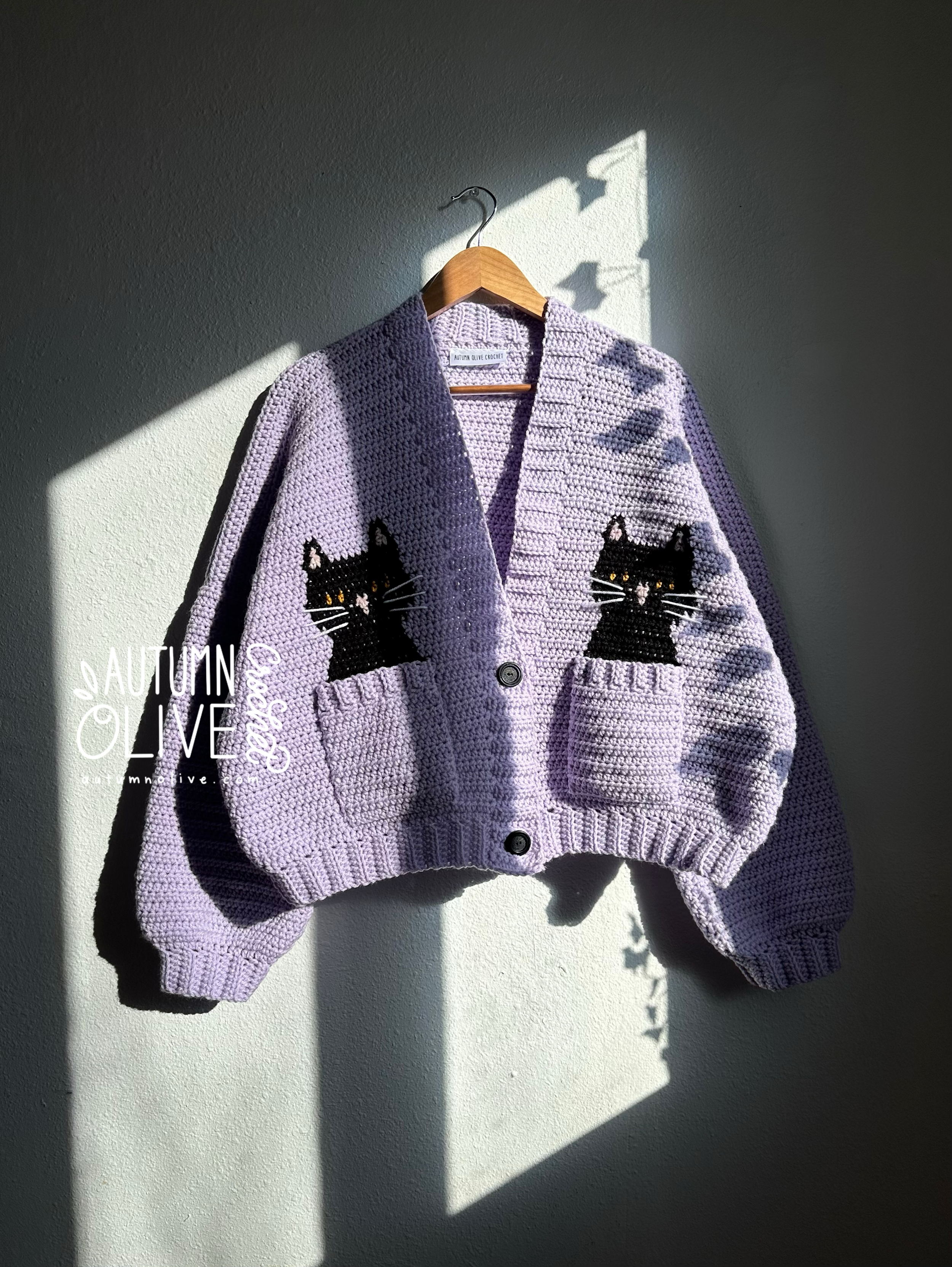 black cat cardigan using solid coat cat | size M