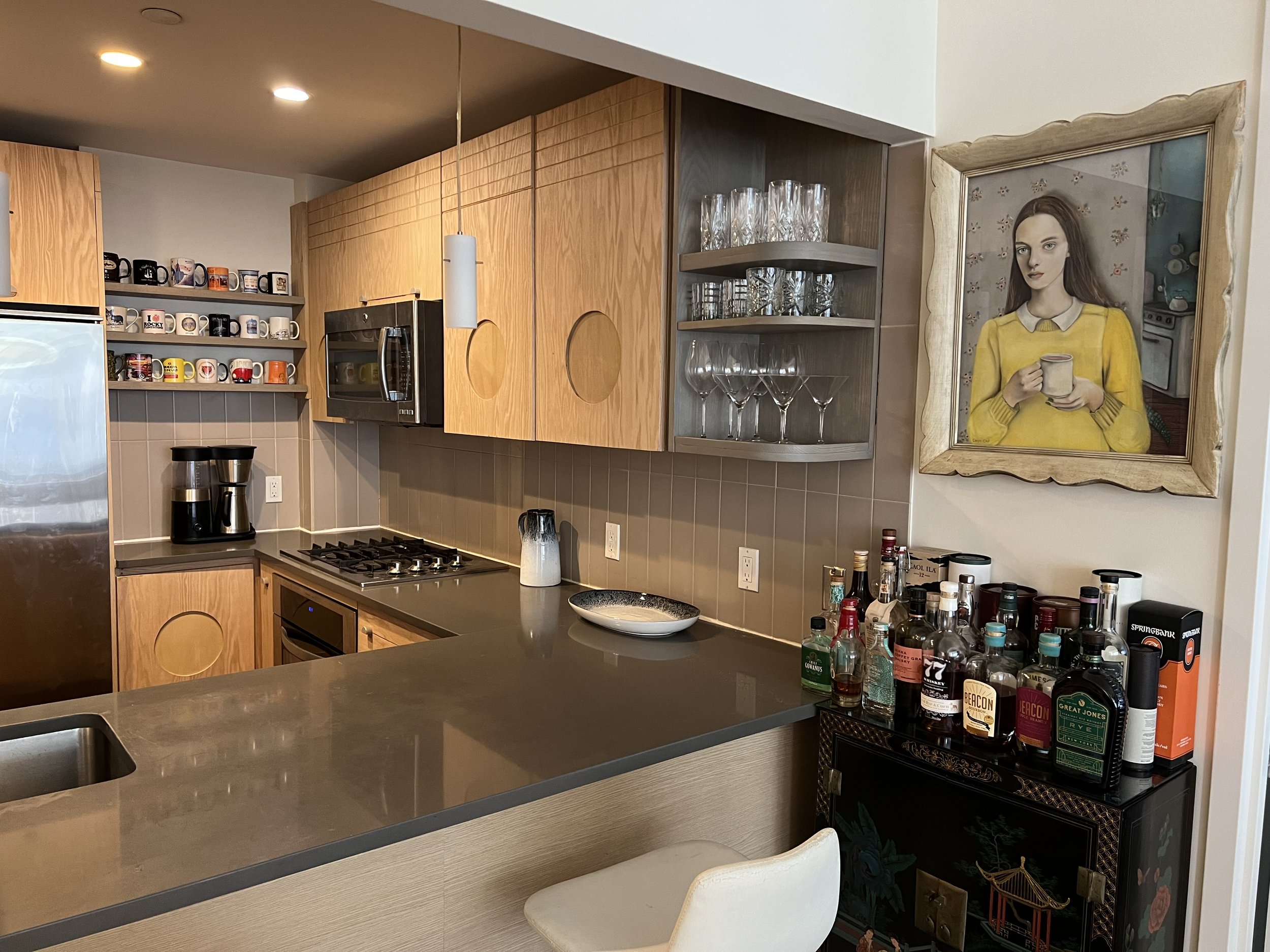 Designed and Provided New Front Panels on all Existing Original Cabinetry with new Corner Bar and Nook Shelving; Red Oak Ply with Solid Butternut Accents 2021