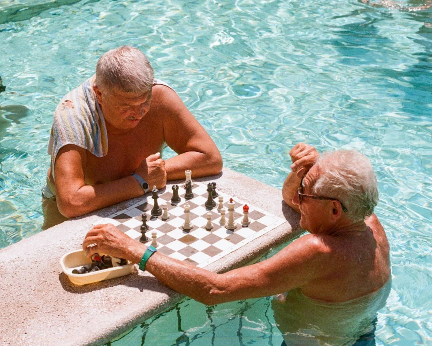 elderly parent playing chess