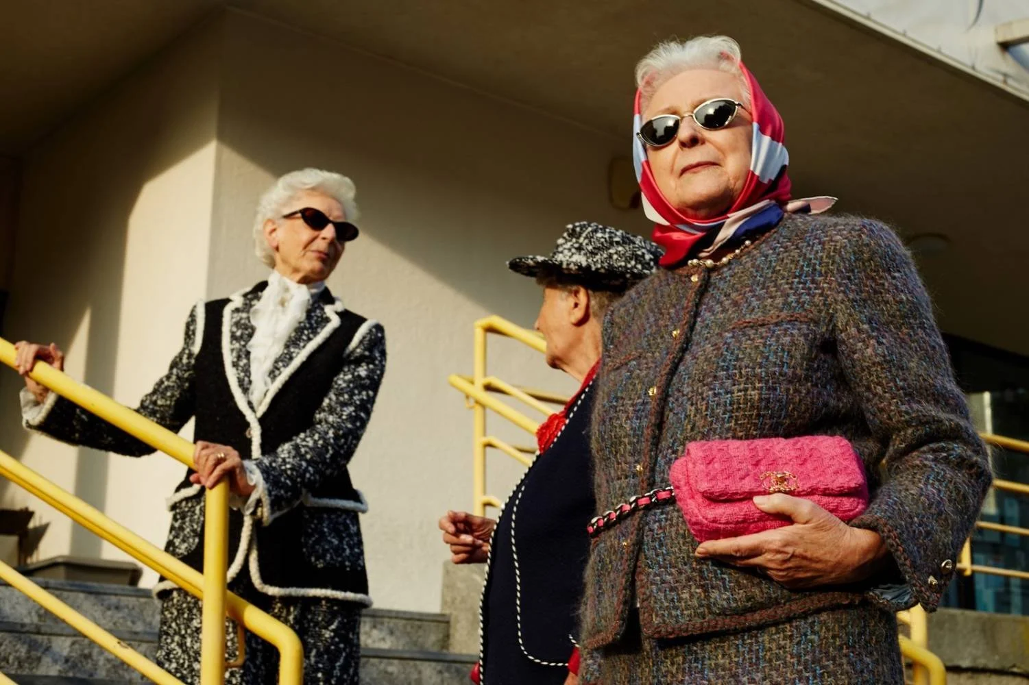 elderly women in formal attire
