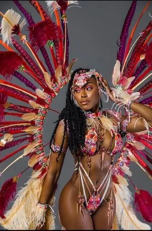   Lockhart celebrates her Trinidadian roots in a Carnival costume  