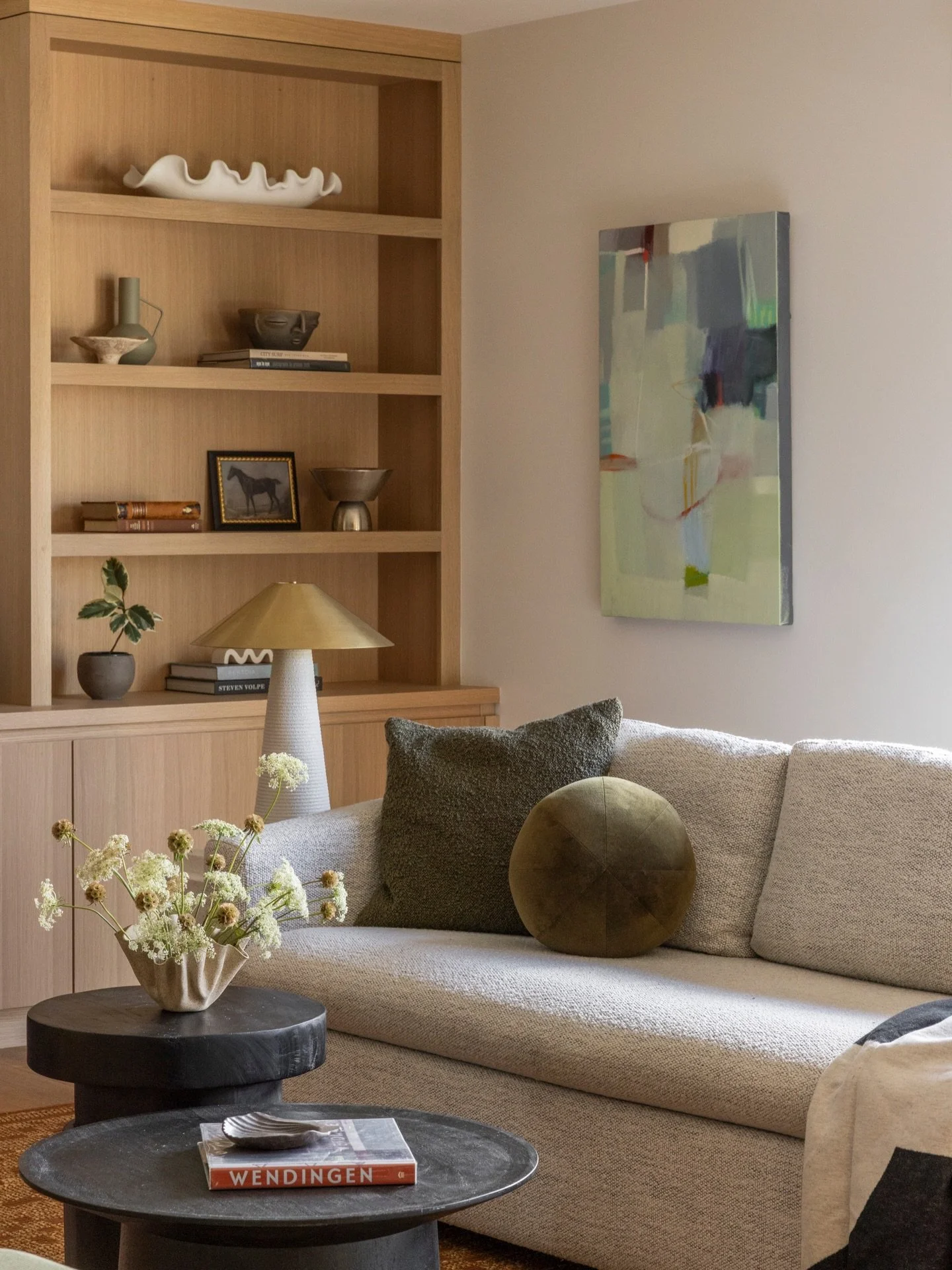 Curated. Intentional. California vibes.

Warm oak built-ins that feel like they&rsquo;ve always been there, a neutral palette that lets the room breathe, and pieces chosen with care.

Nothing overdone, just thoughtful layers that make it feel like ho