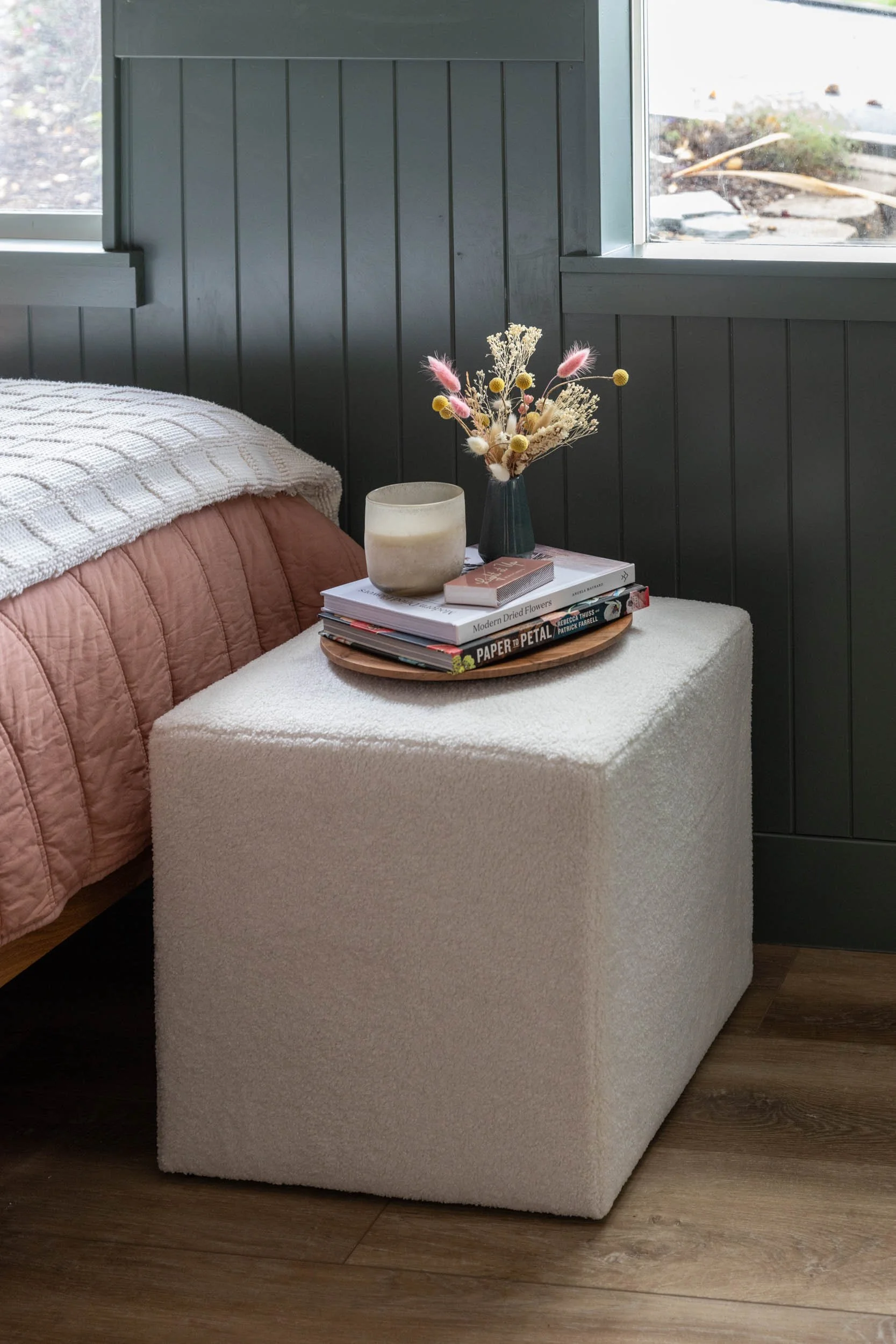 Bedroom end table with green wainscoting