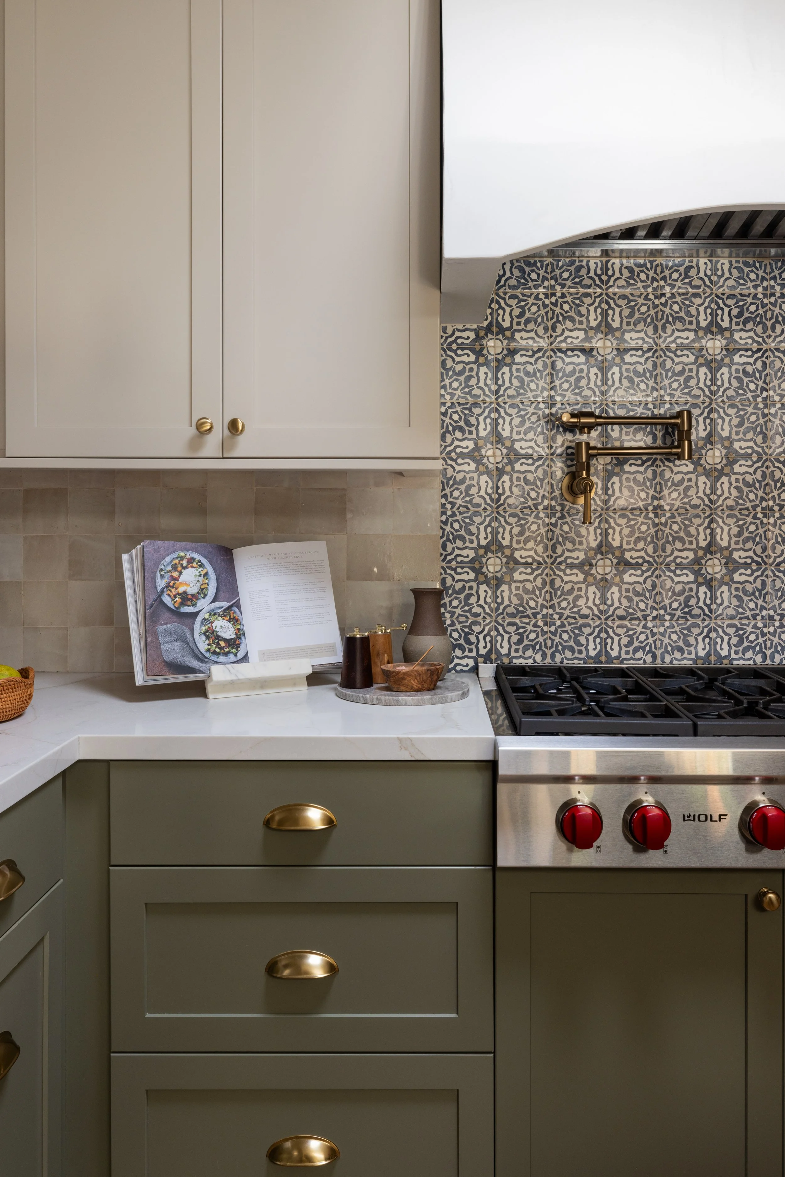 kitchen range, backsplash and pot filler