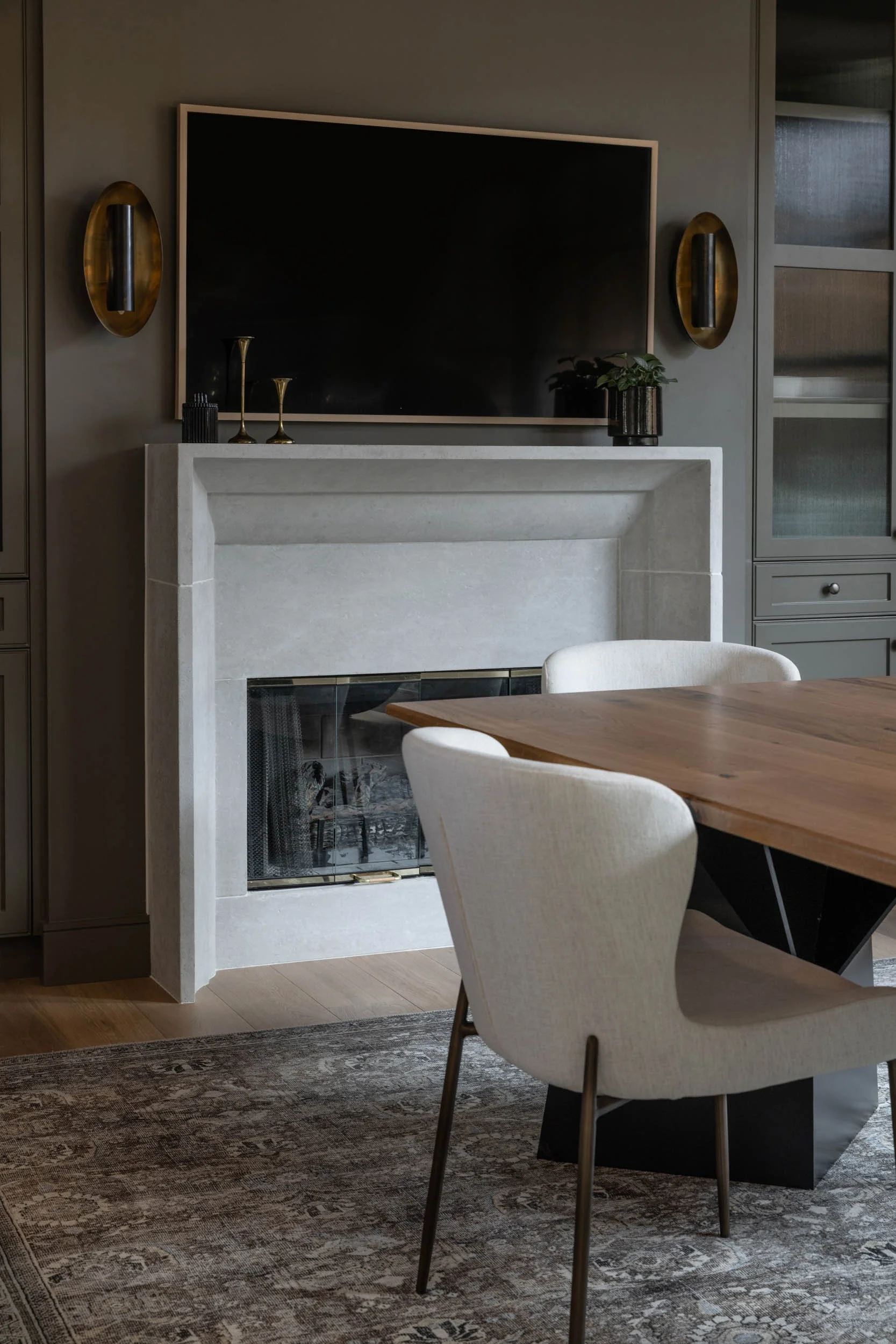 Fireplace, light fixture and mounted TV