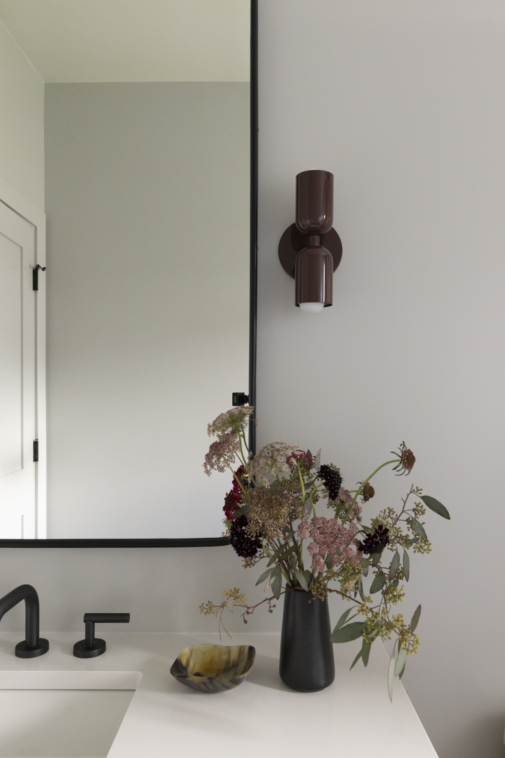 guest bathroom vanity and light fixture