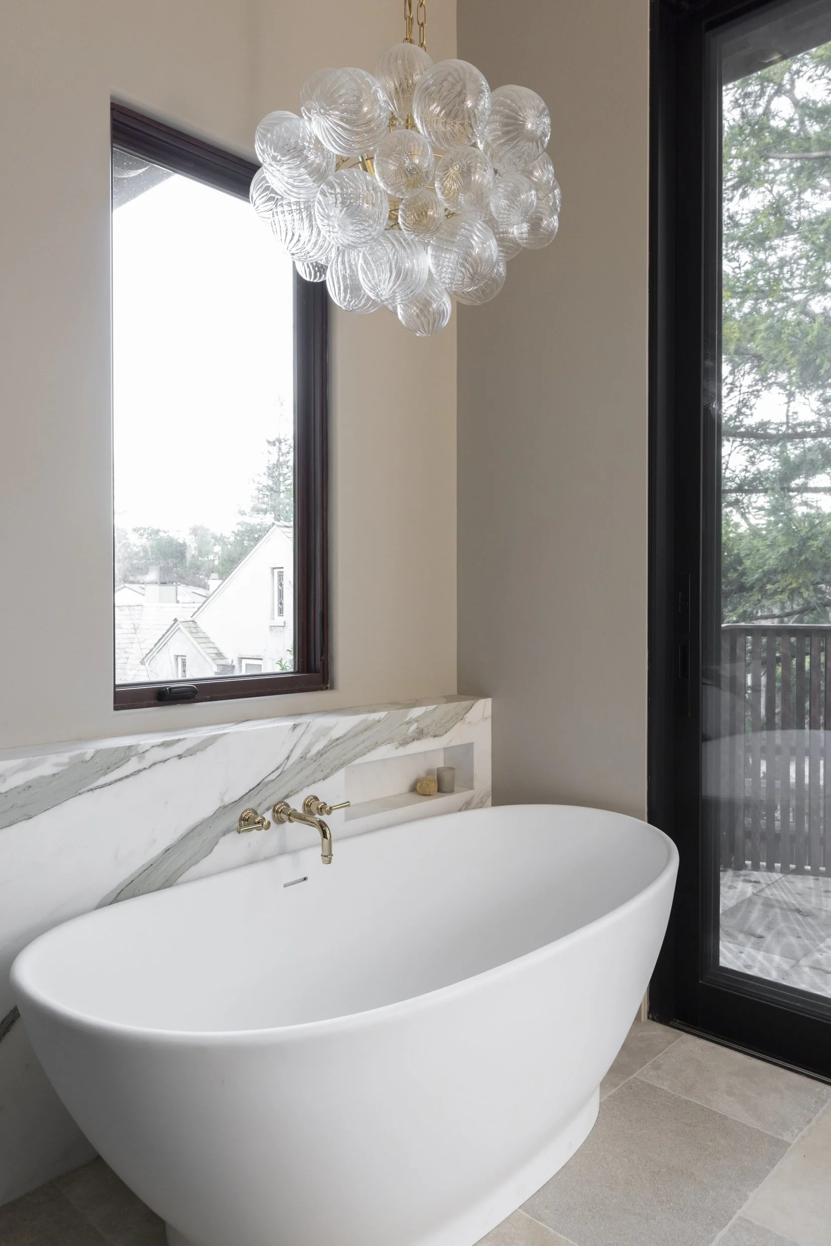 Soaking tub with chandelier
