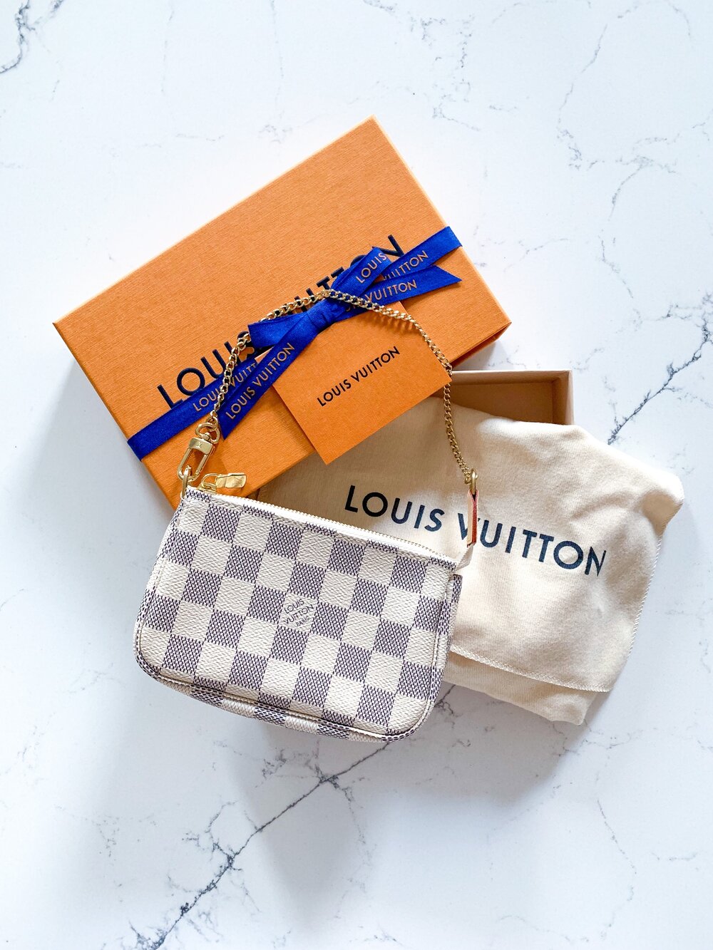 Louis Vuitton - Mini Pochette Damier Azur — Lia & Phie Luxury
