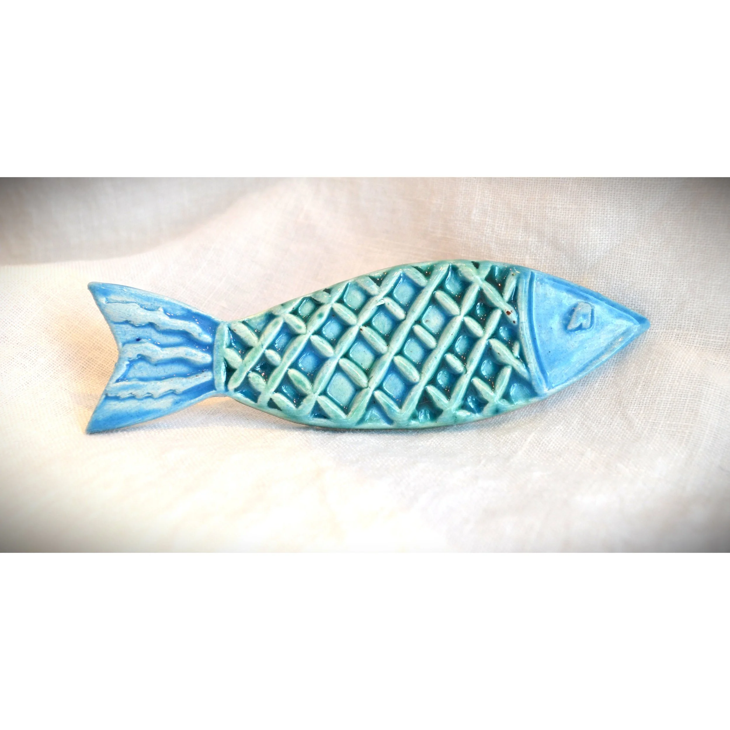 CMU blue fish brooch 2.jpg