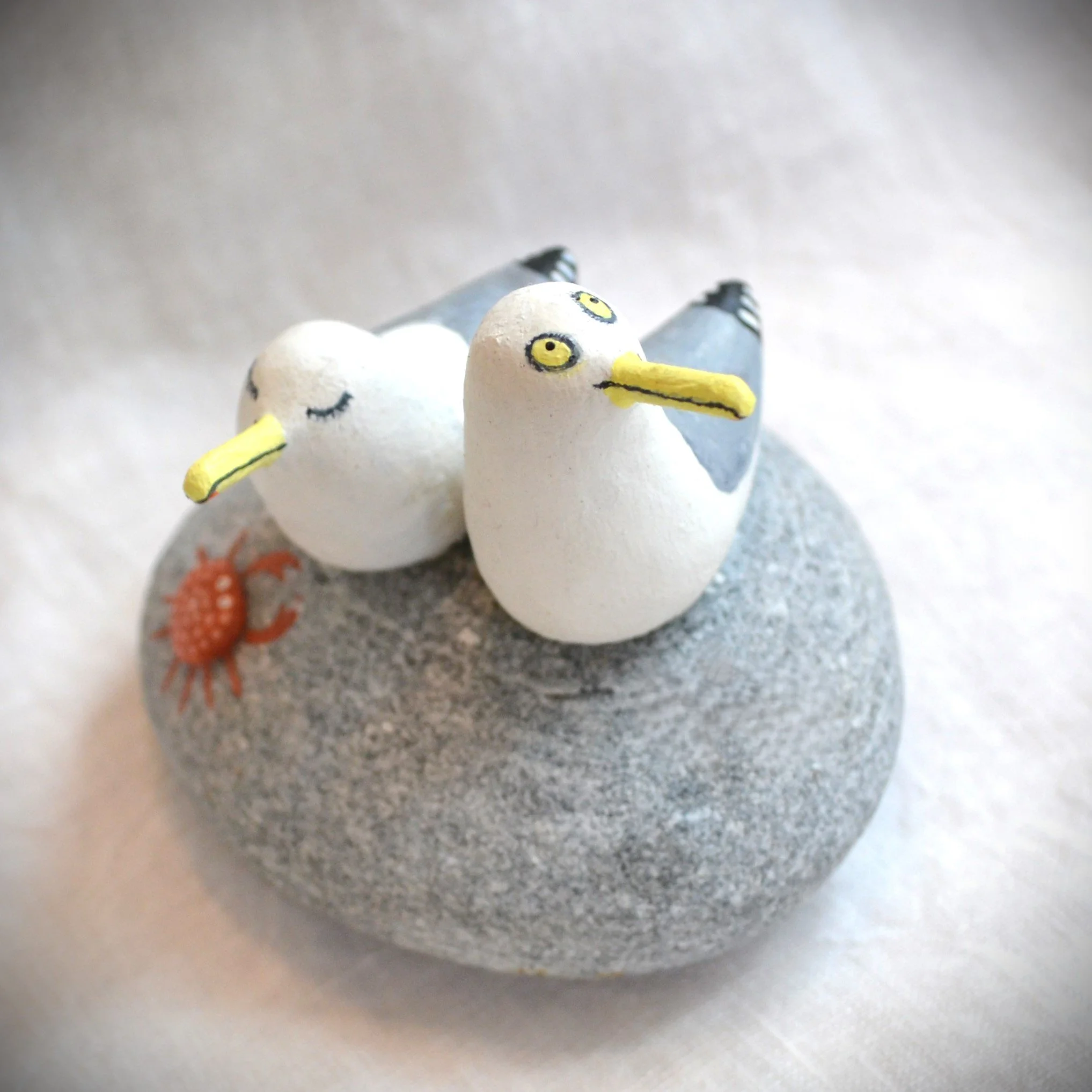 Two Gulls and a Crab