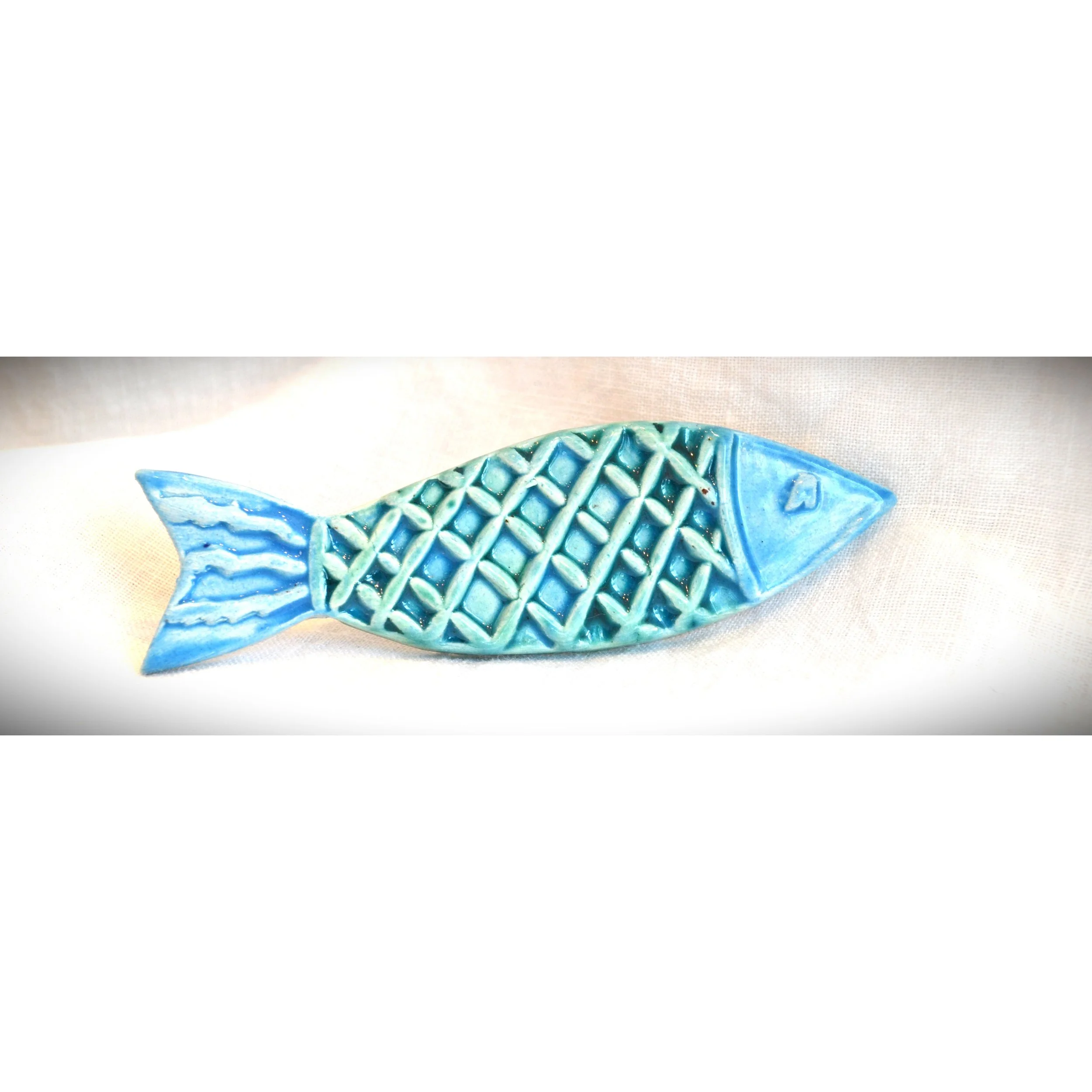 CMU blue fish brooch 3.jpg
