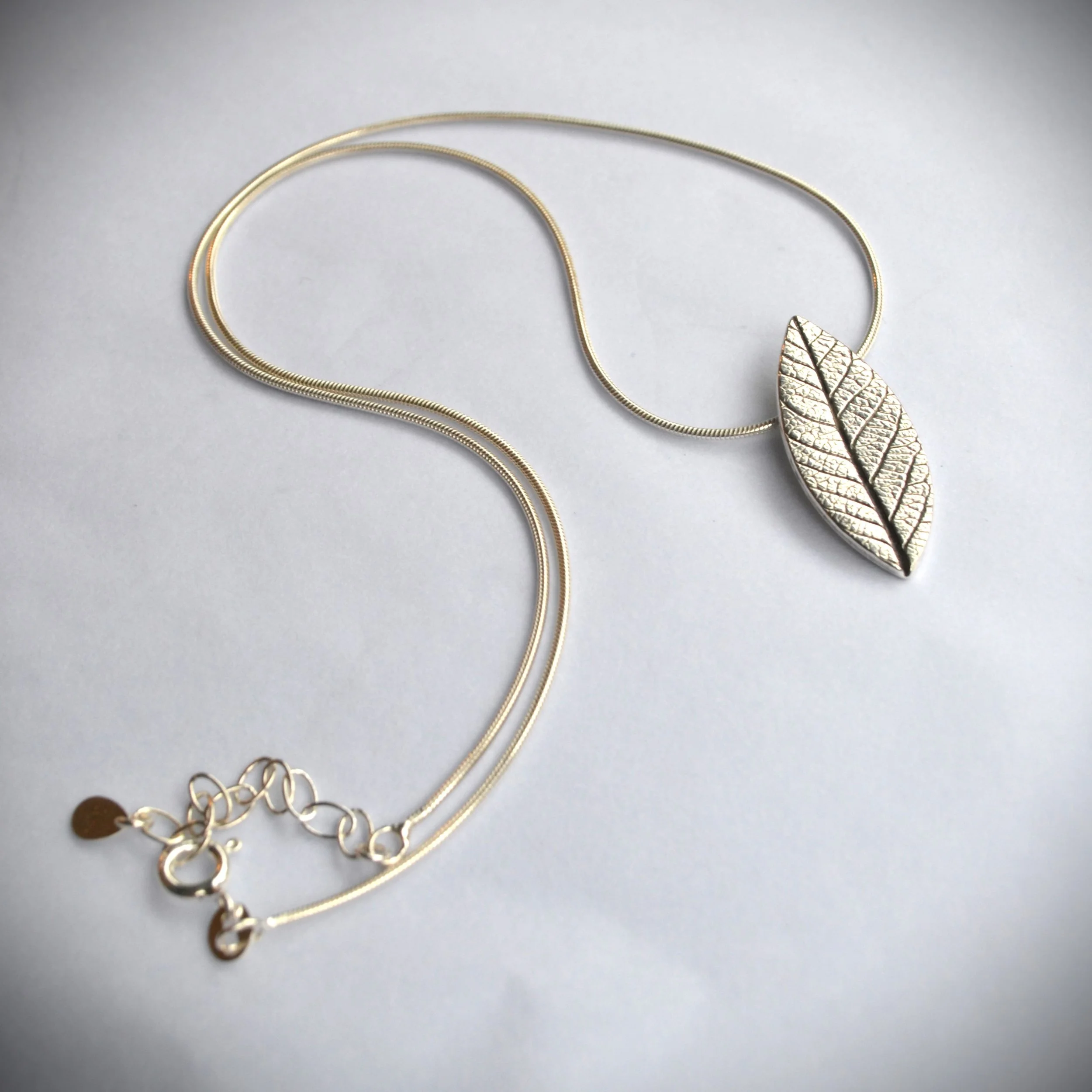 Leaf on silver chain pendant