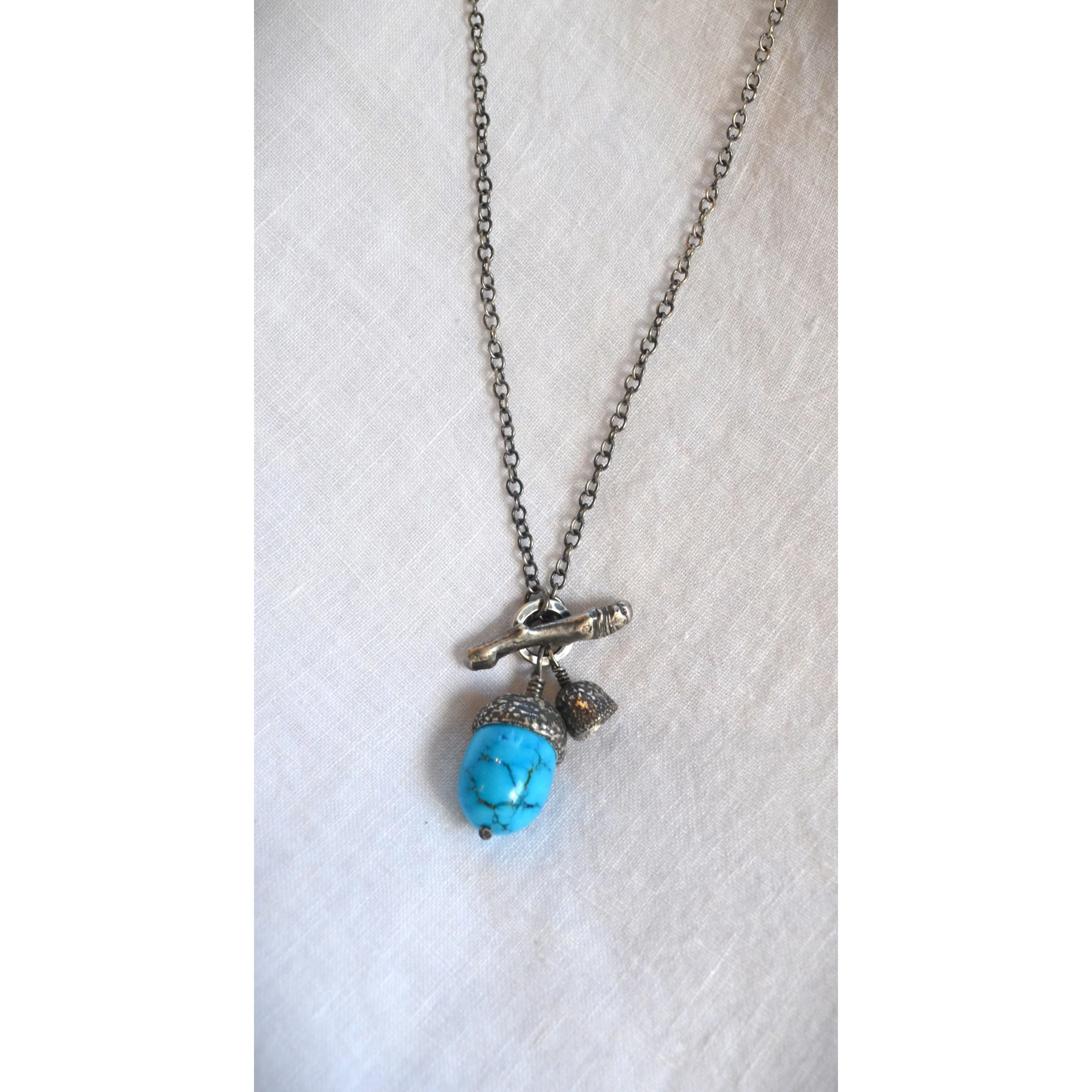 Turquoise acorn on chain
