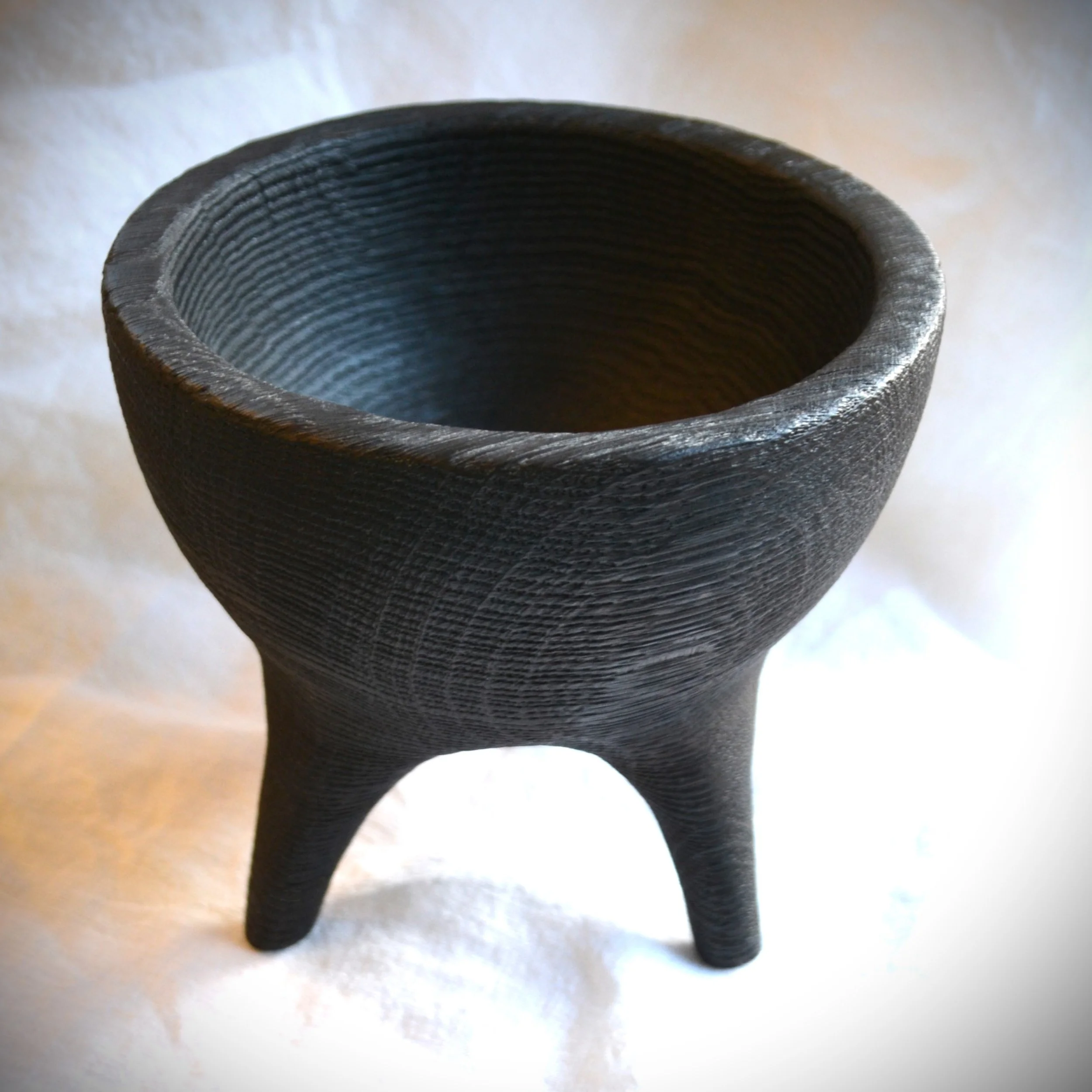 black scorched three legged ritual bowl 3.jpg