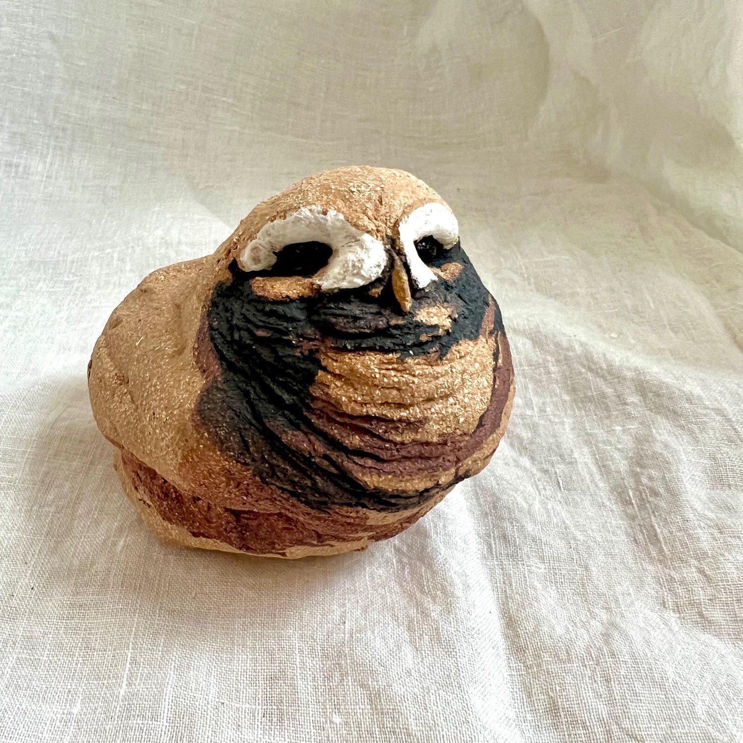 Tiny brown owl
