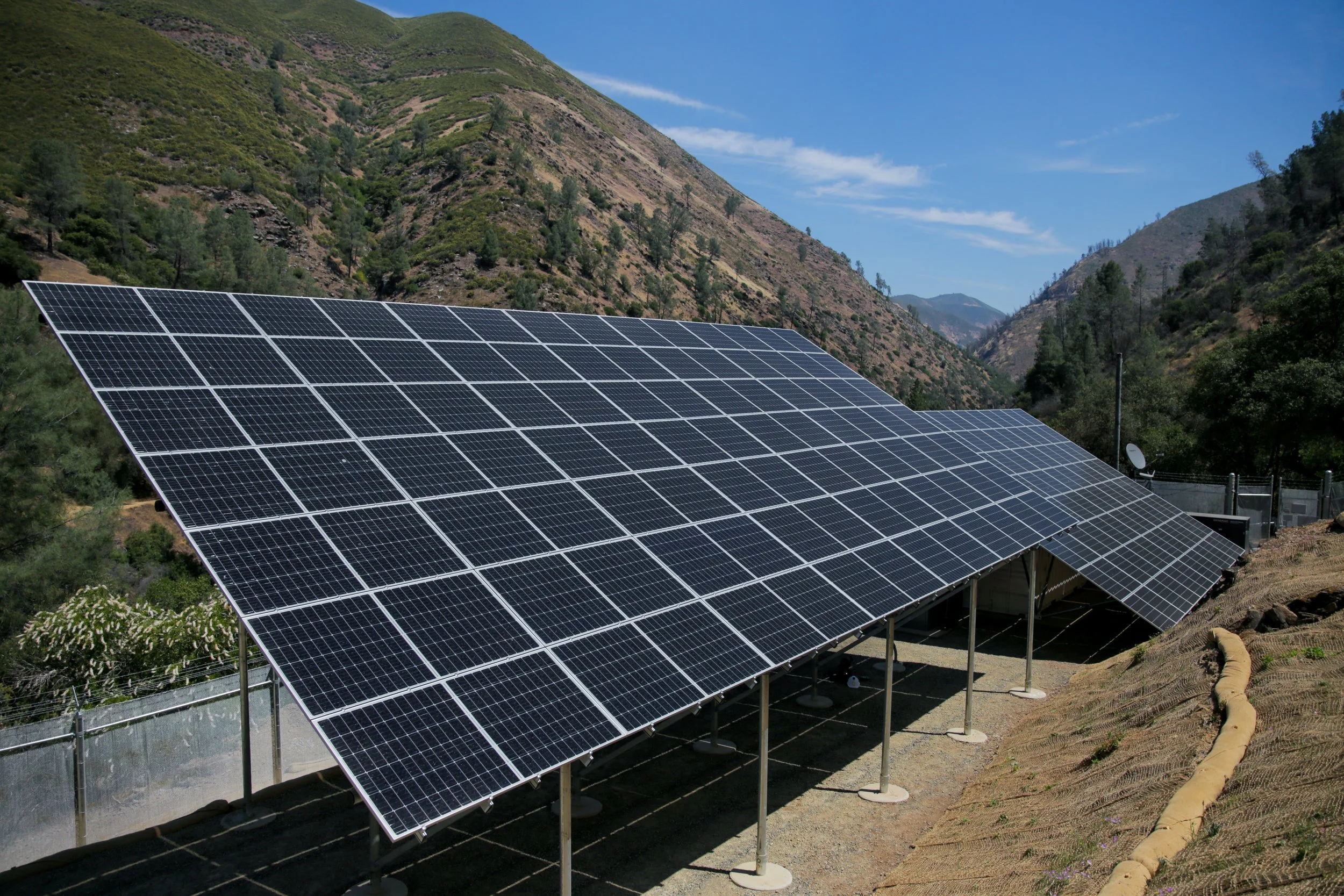 Photo of two large solar arrays