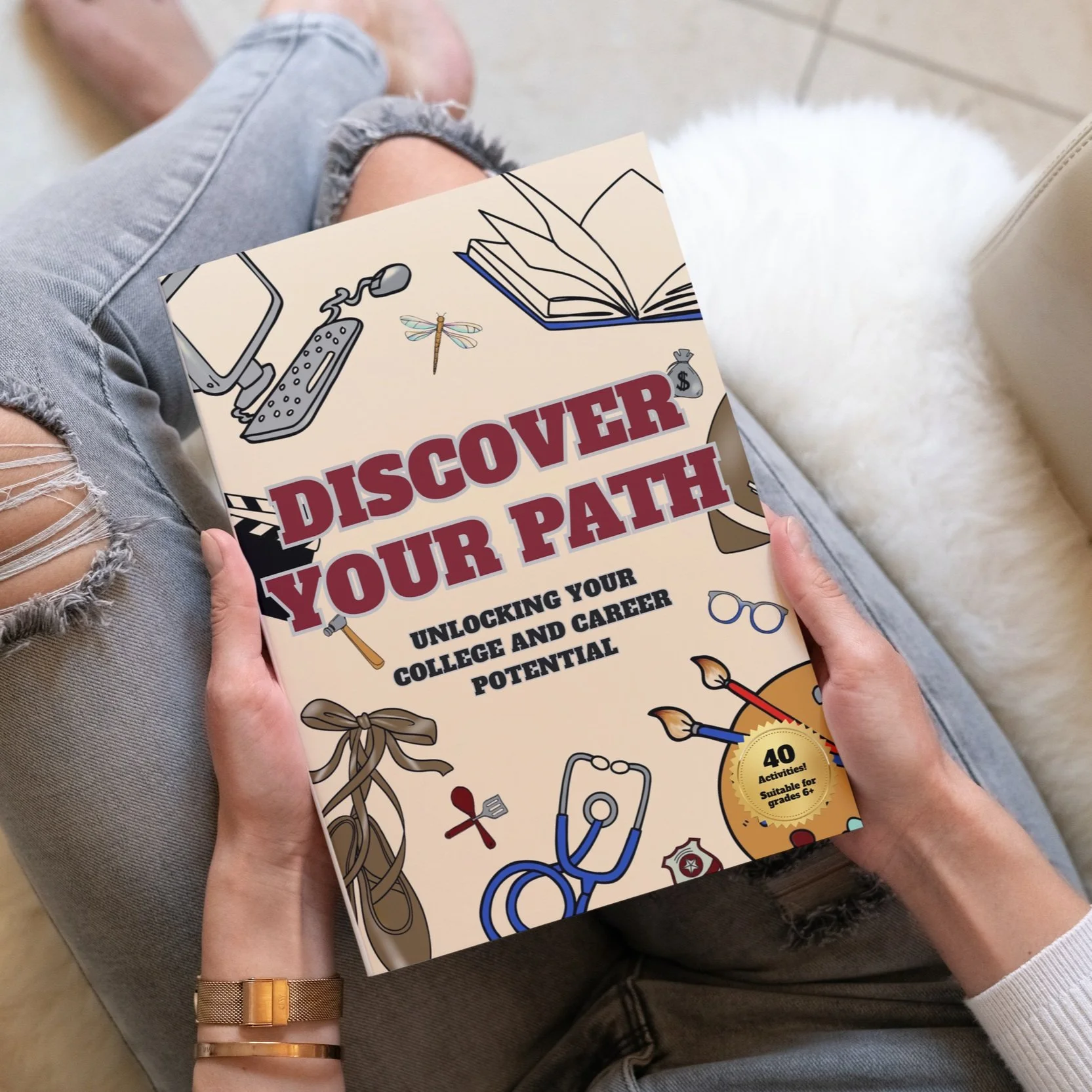 A young woman holding a copy of the book Discover Your Path: Unlocking Your College and Career Potential