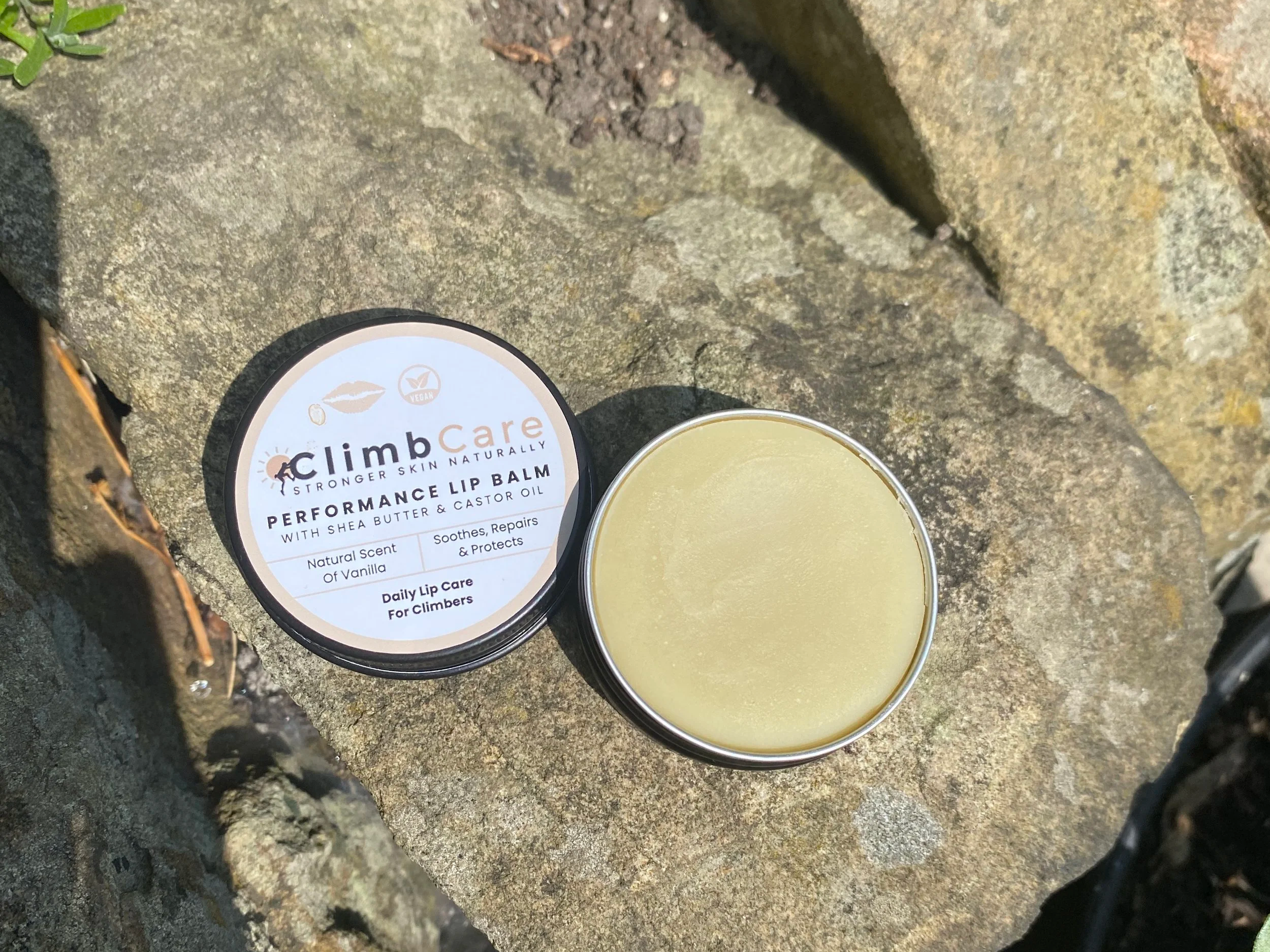 Open tin of ClimbCare Performance Lip Balm
