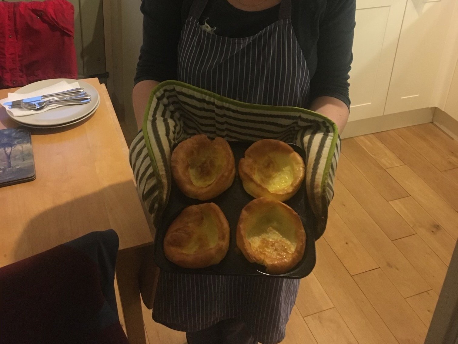 Four Yorkshire Puddings just out of the oven