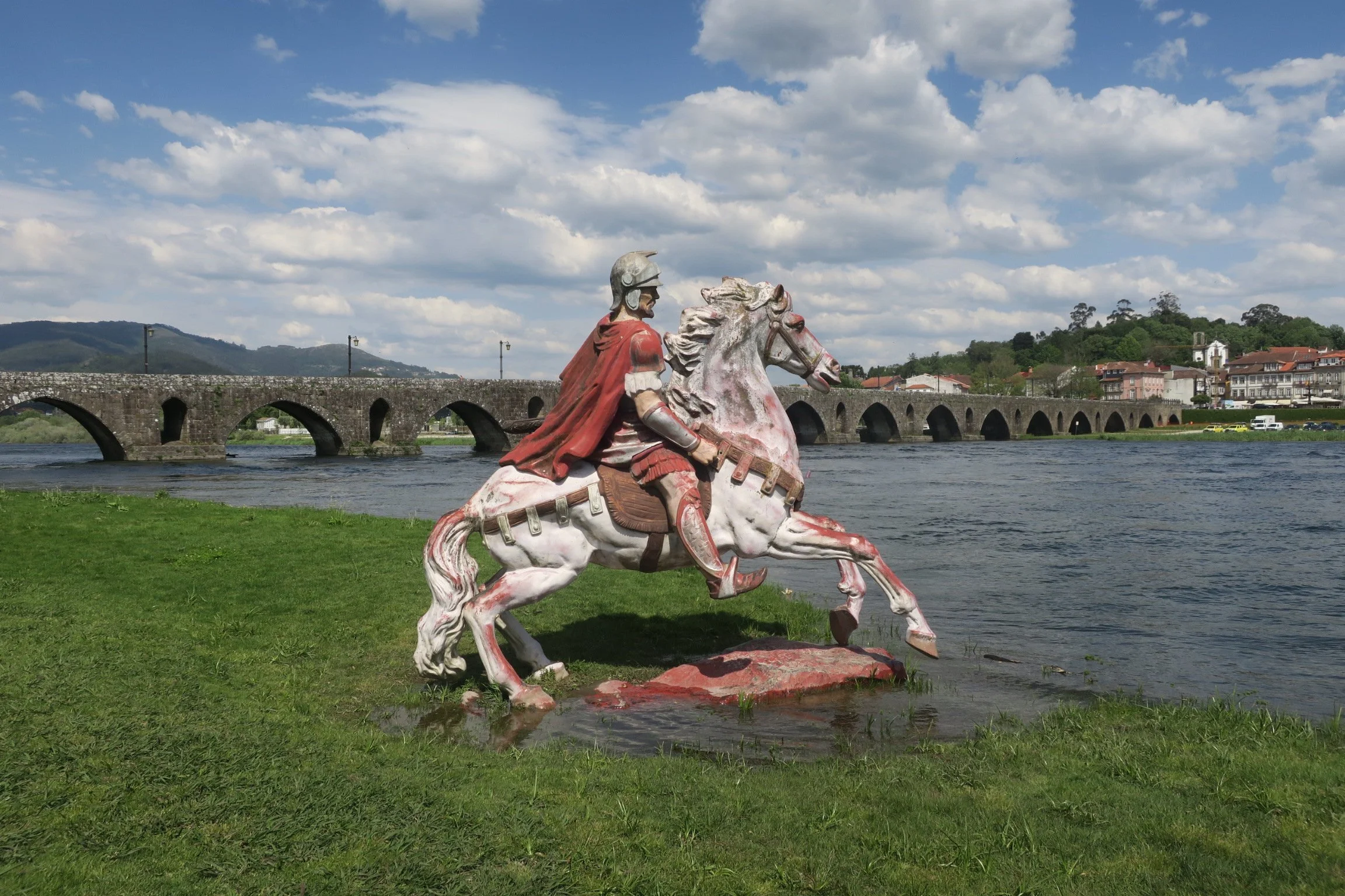 Legendary Roman general watching over the River Lima with the Roman bridge behind
