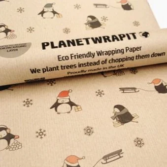 Planetwrapit penguin and snowflake wrapping paper
