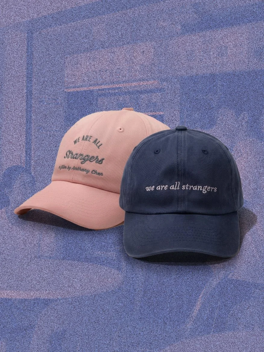 WE ARE ALL STRANGERS: Cap