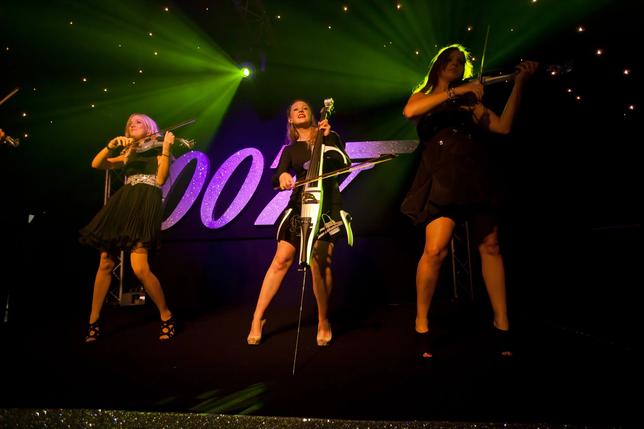 Event photography - Electra String Trio perform at 007-themed event in Wilmslow Cheshire