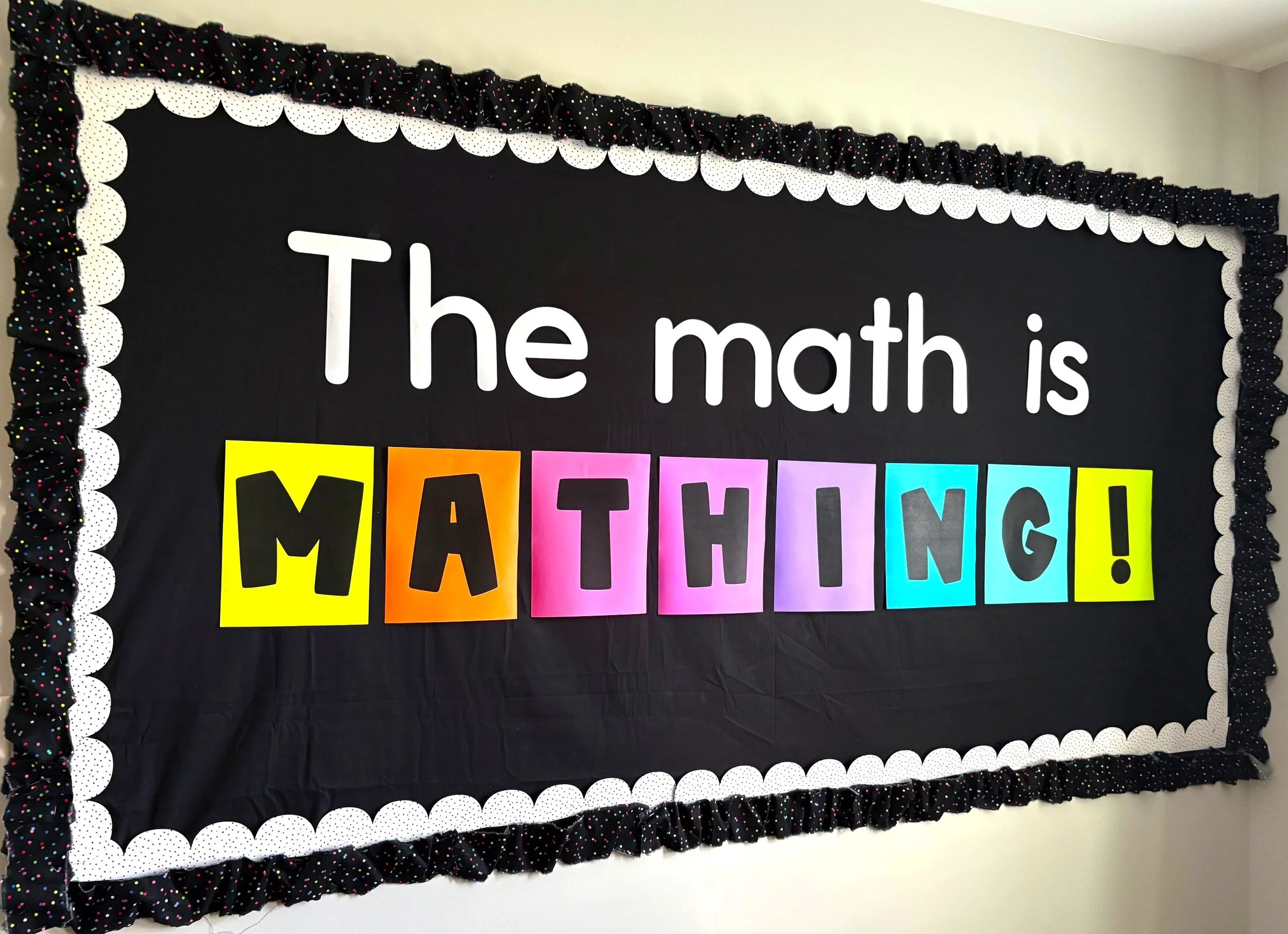 bulletin board that says, "the math is mathing"