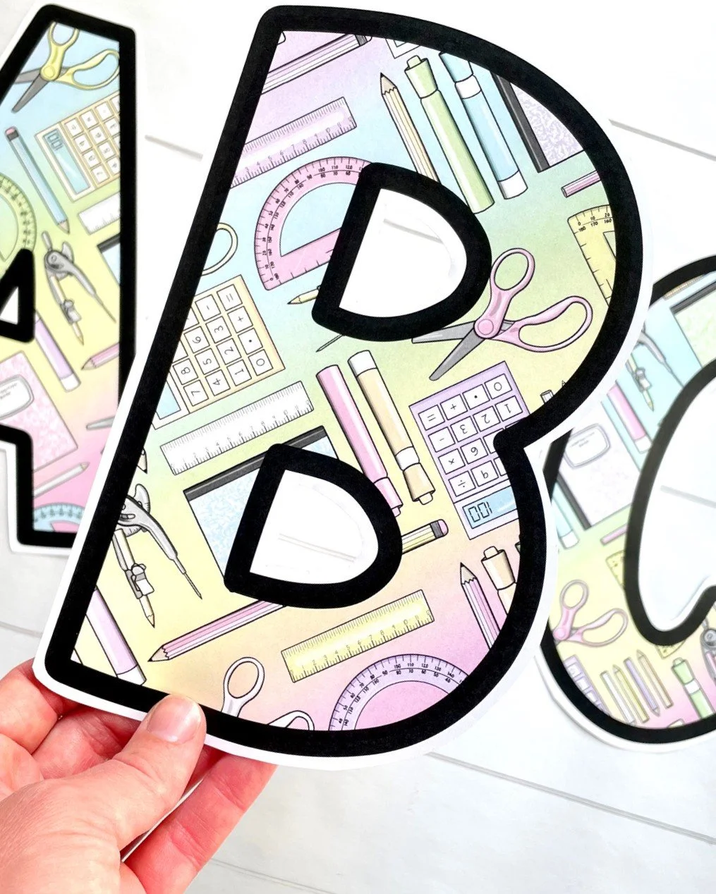 Bulletin board letters with pastel math supplies
