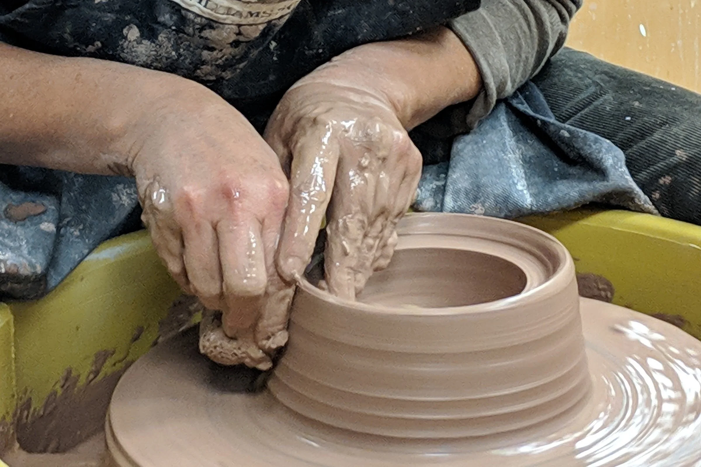 starting first pulls on the pottery wheel
