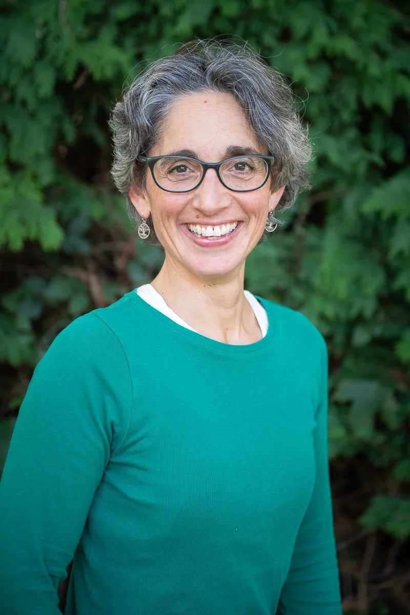 headshot of Carine yoga teacher