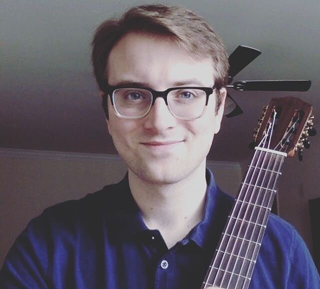 Meet Travis, our new guitar instructor. We are so excited to have Travis join the Musical Journeys family! He is a classical trained guitarist who also teaches ukulele. Contact us if you&rsquo;d like to start lessons this summer!