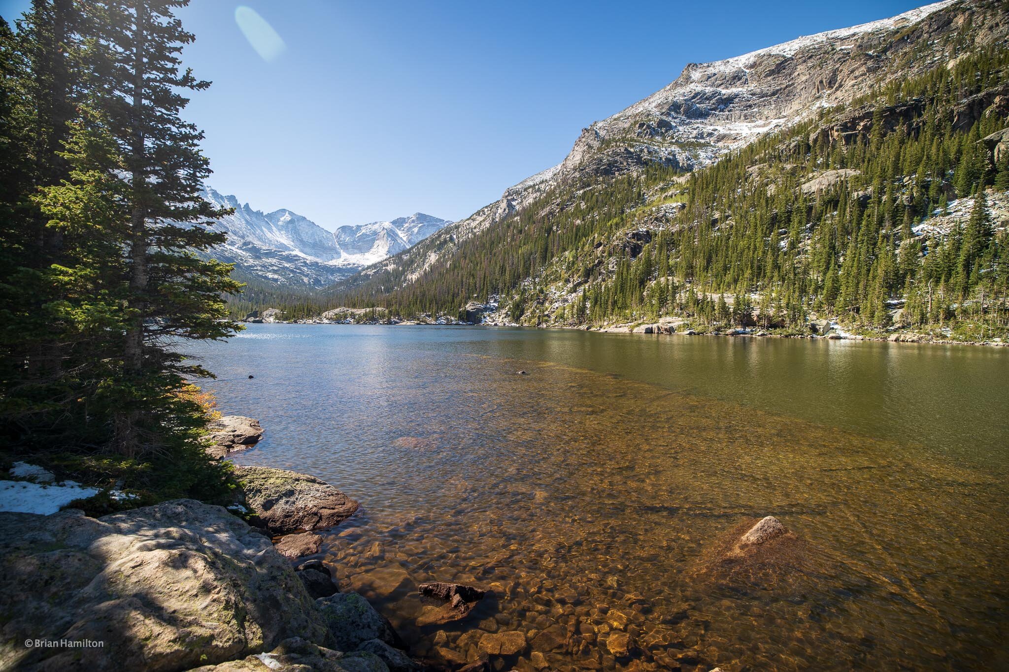 Mills Lake via Glacier Gorge Trail  - Mills Lake via Glacier Gorge Trail is a moderate 4.9 mile heavily trafficked out and back trail located in Rocky Mountain National Park near Estes Park, Colorado that features a waterfall and a lake.