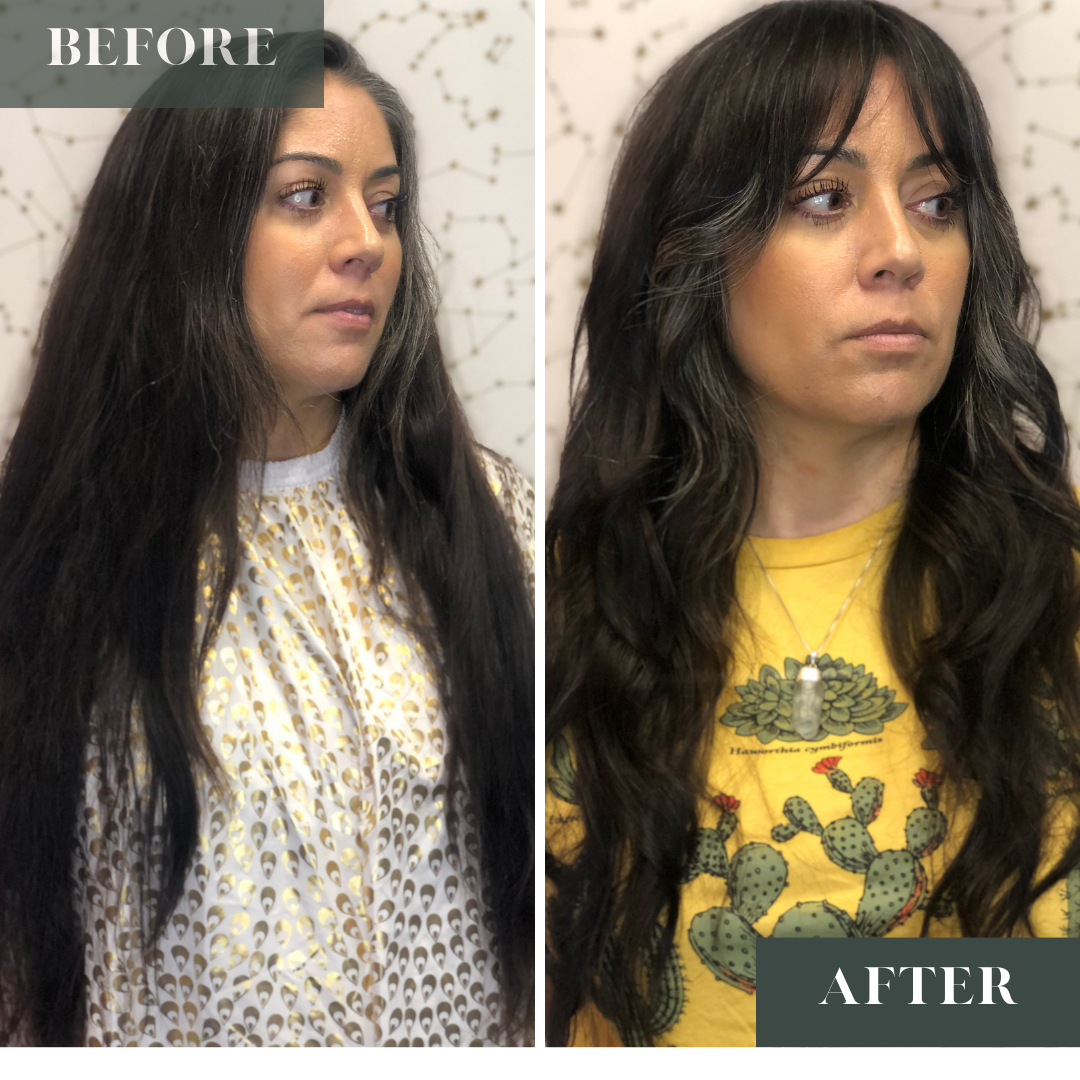 Shaggy cut on wavy brunette hair with her own natural grey hair growing in.