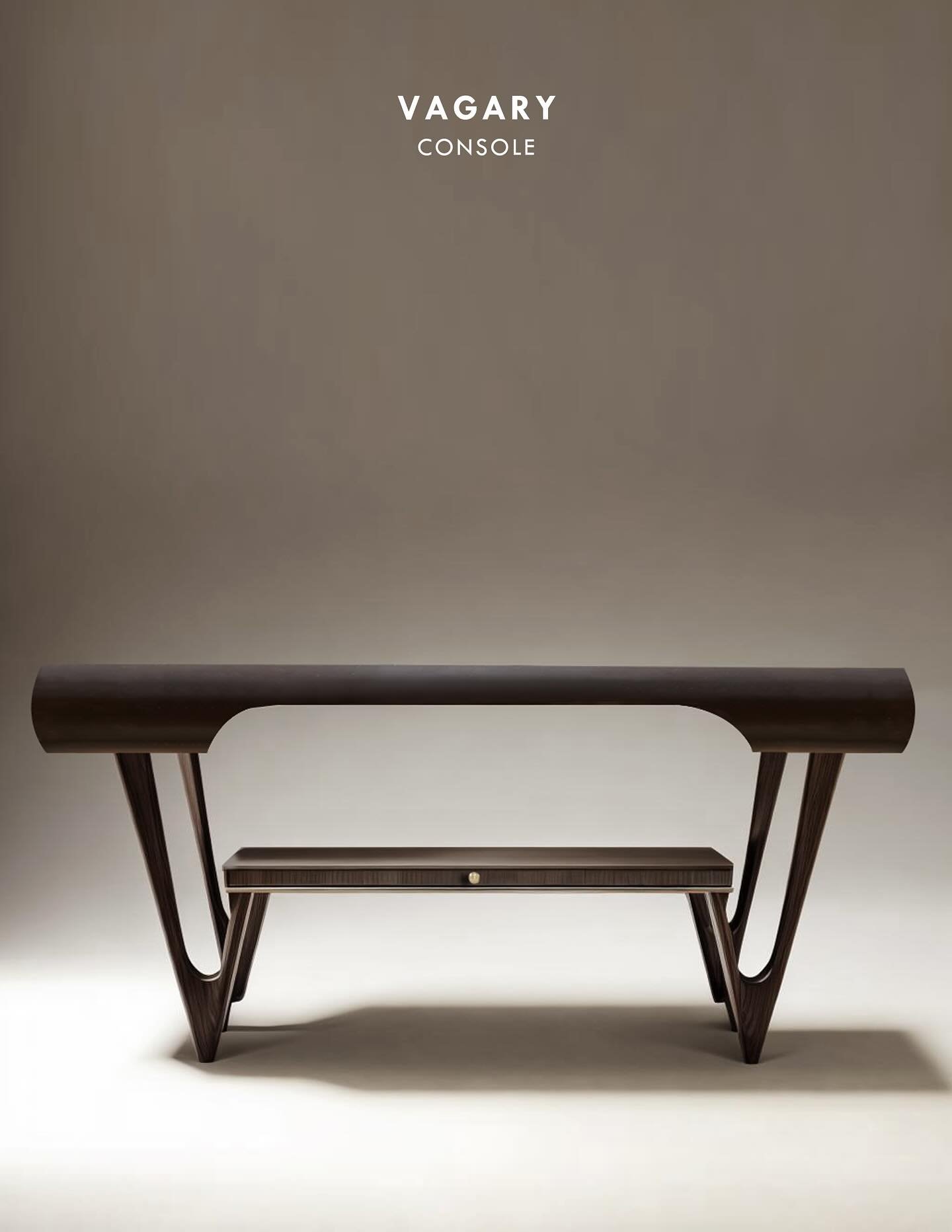 VAGARY CONSOLE 

The Vagary console exemplifies a refined integration of simplicity and functionality, with each component meticulously designed to reflect the principles of modernism. Its polished ORB brass top enhances a distinctive design, conveyi