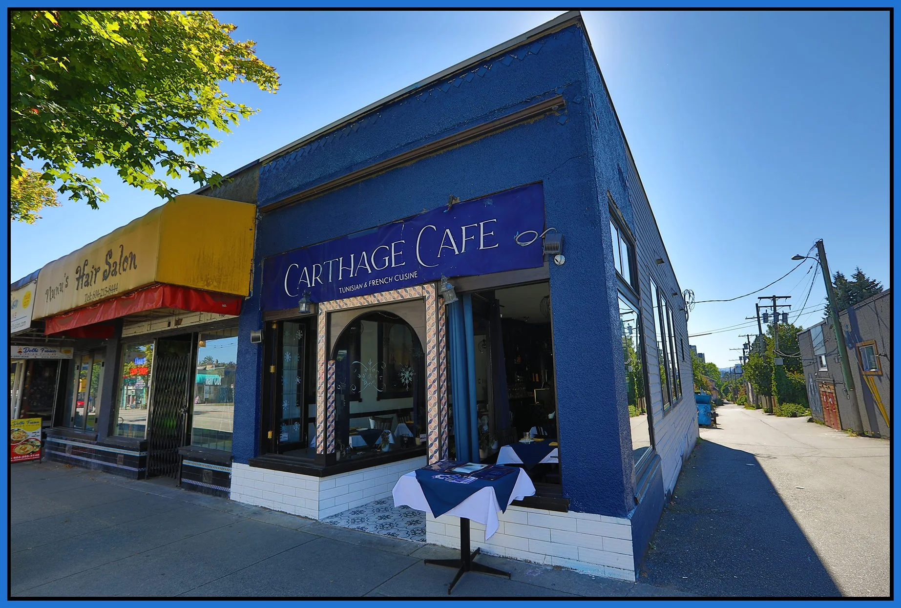 1831 Commercial Dr_Curbside Seating_Carthage Cafe_Jul 7_2024_HDR_5E6220_4x6s.jpg