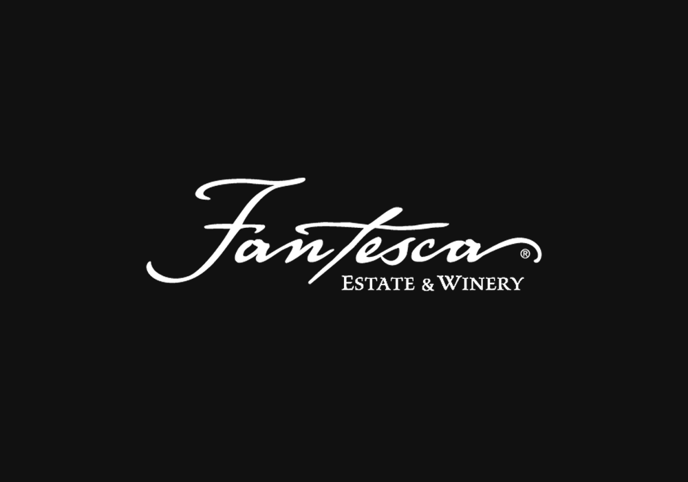 Fantesca Estate & Winery white logo on black