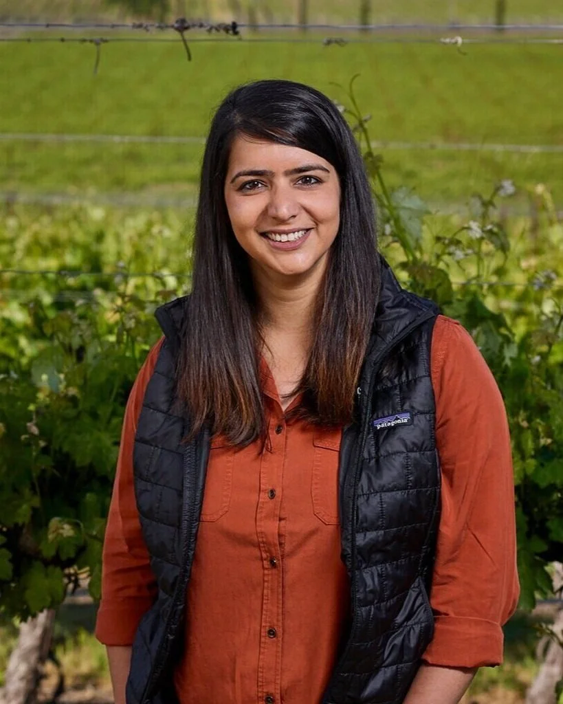 Priyanka French smiling outside in a vinyard