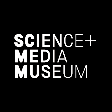a black background with white writing that reads 'Science + Media Museum'