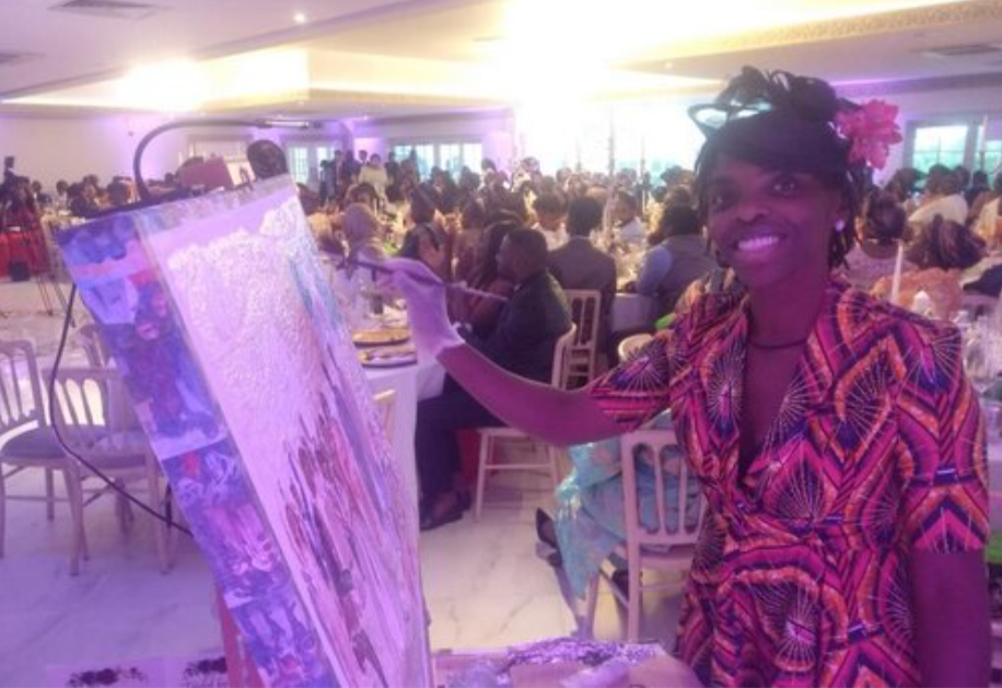 me painting at theo and tobis wedding.png