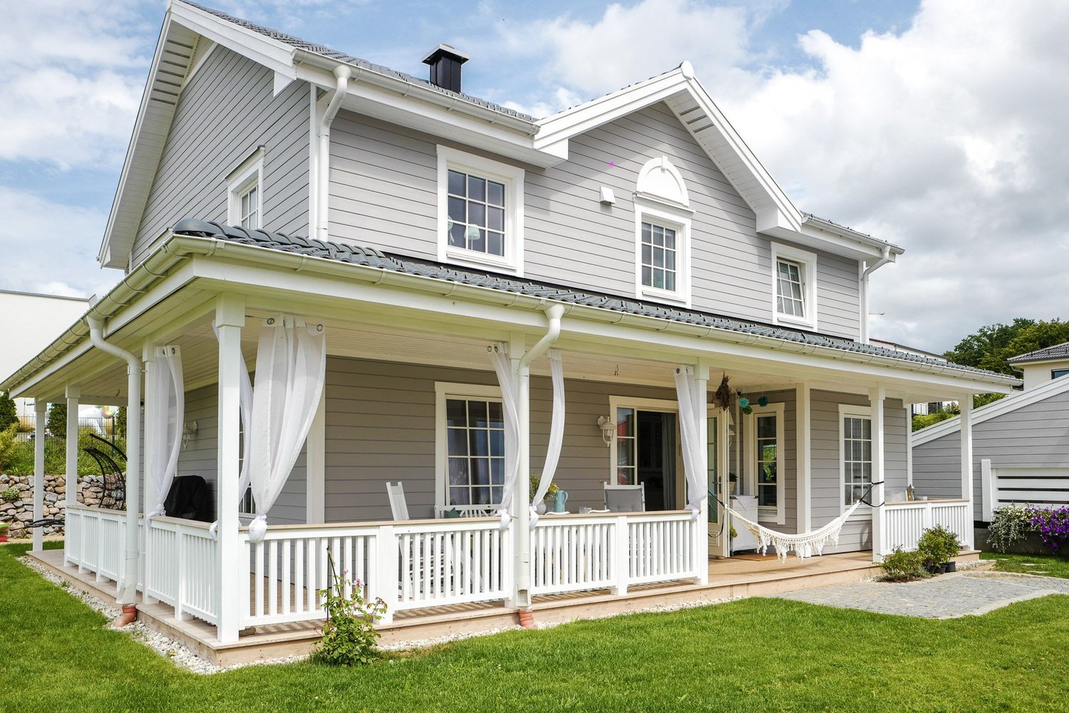 Schlüsselfertiges Schwedenhaus von Greenville mit umlaufender Veranda