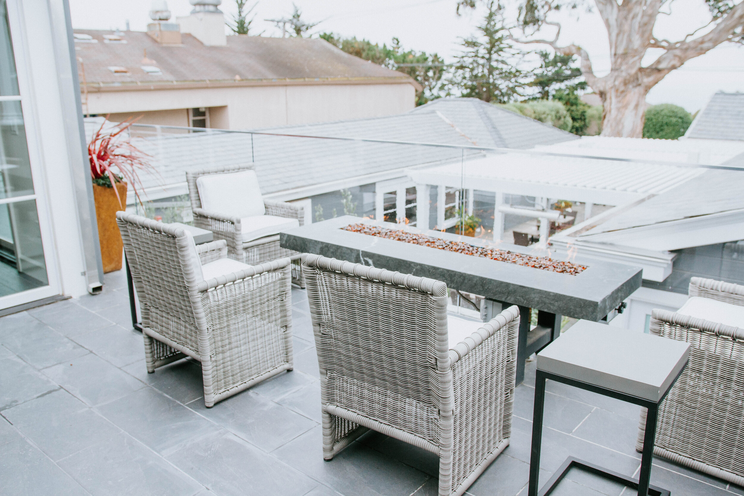 Fire Table with Chairs Overlooking Courtyard and Oceanview