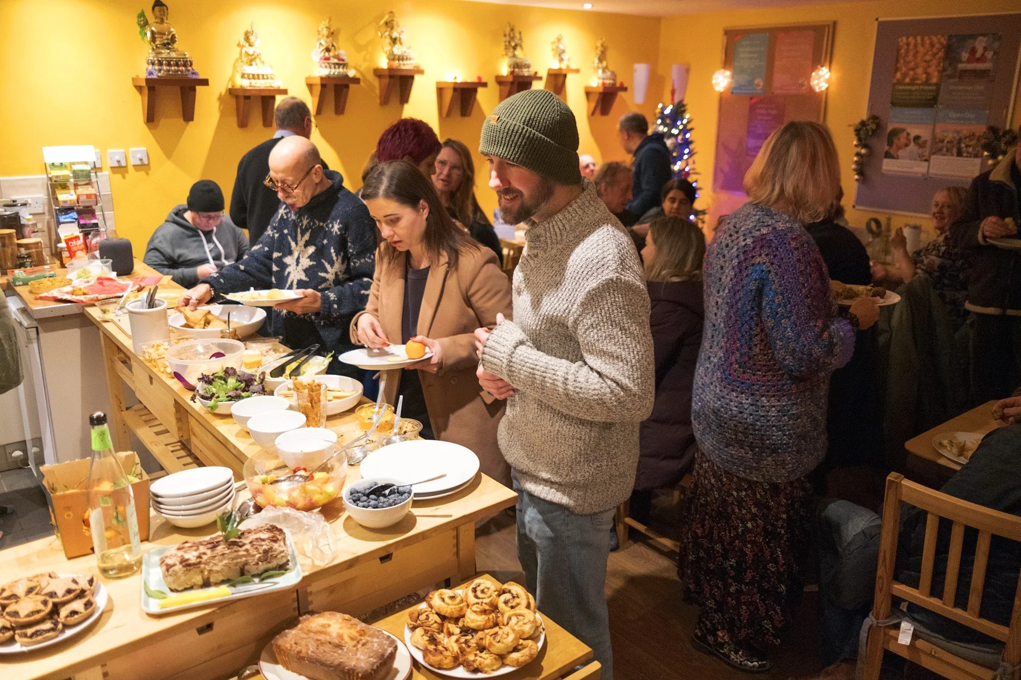 Sharing food at the bring-and-share social after Candlelight Prayers in 2023.
