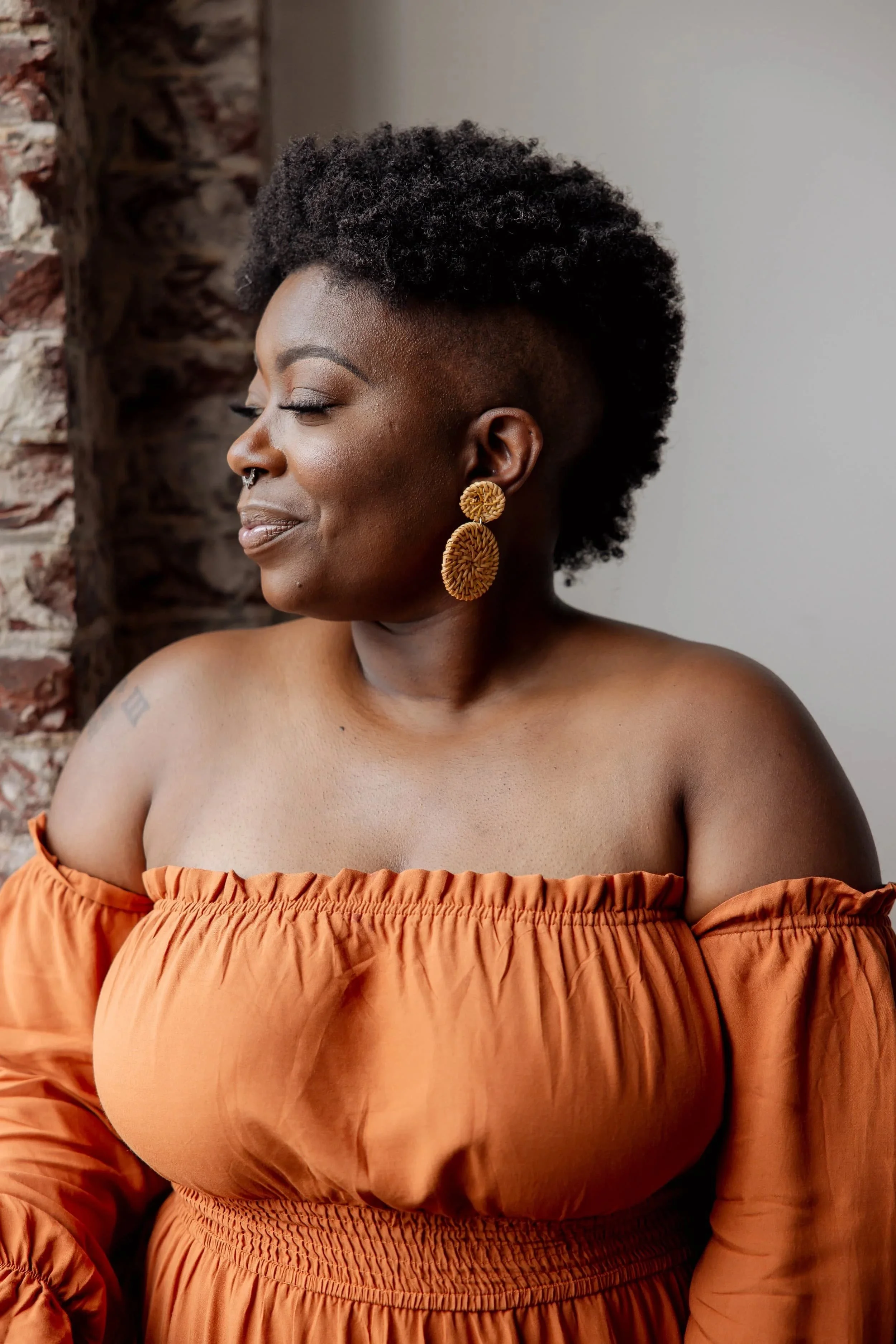 Professional headshot of Sabia Wade, a doula, educator,  author, spiritual care practitioner and entrepreneur.