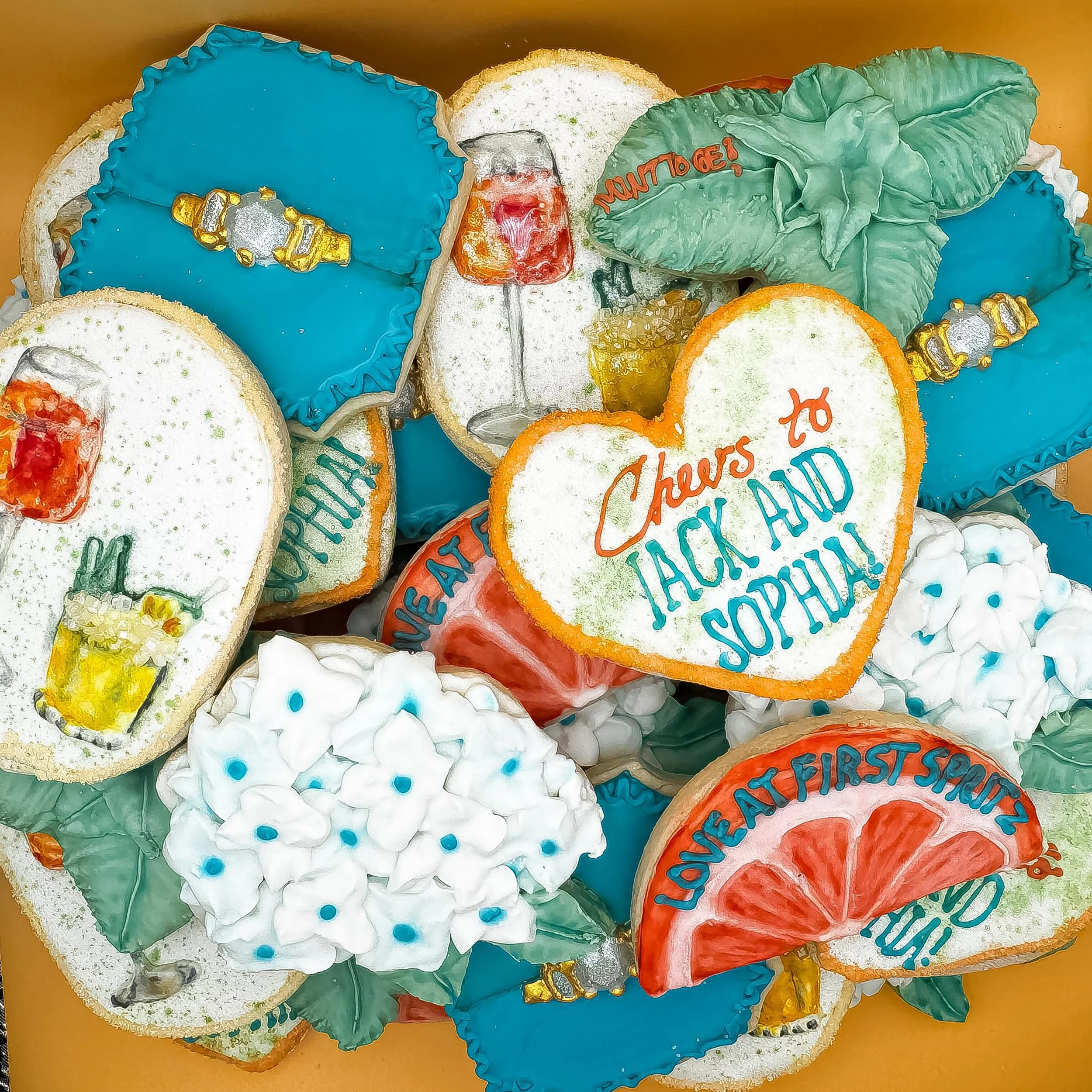 Love at first spritz&hellip; mint to be!🍹💍✨

This engagement party set was extra special for so many reasons. Every cookie featured hand-painted details using food coloring gel mixed with almond extract, and I got to experiment with isomalt sugar f