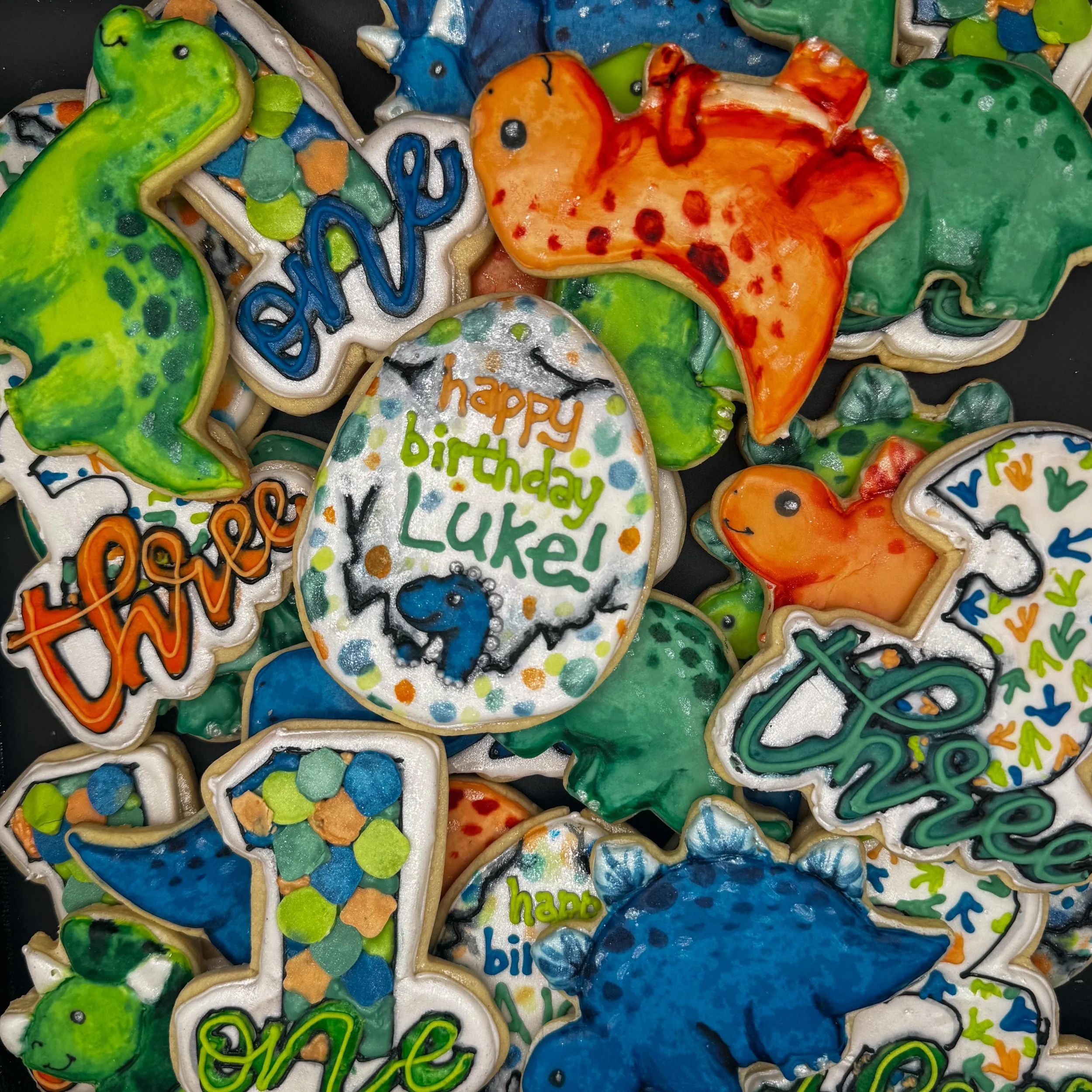 One thing about me.. I will always yes to a dino theme! 🦖🦕

I had so much fun painting each individual dinosaur! I also wanted to shout out @rosegoldcookieco for the inspiration on the Dino scales for the number 1 cookie! I&rsquo;m so happy with ho