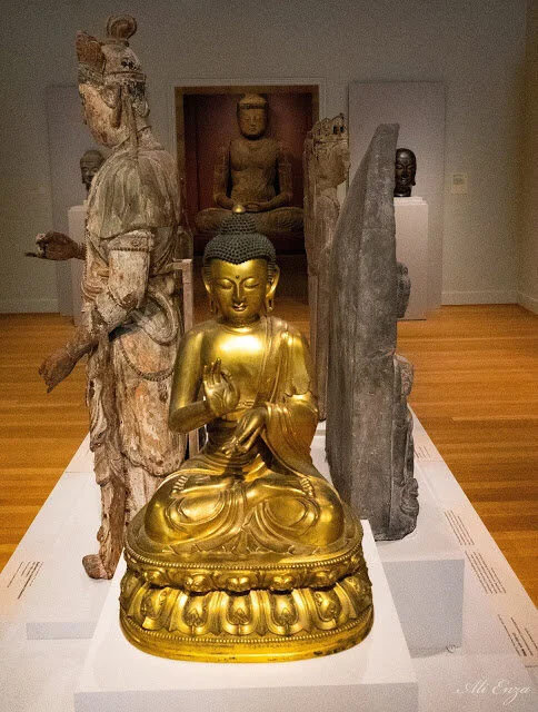 Golden Buddha vs. Wooden Buddha. Both are absolutely amazing!